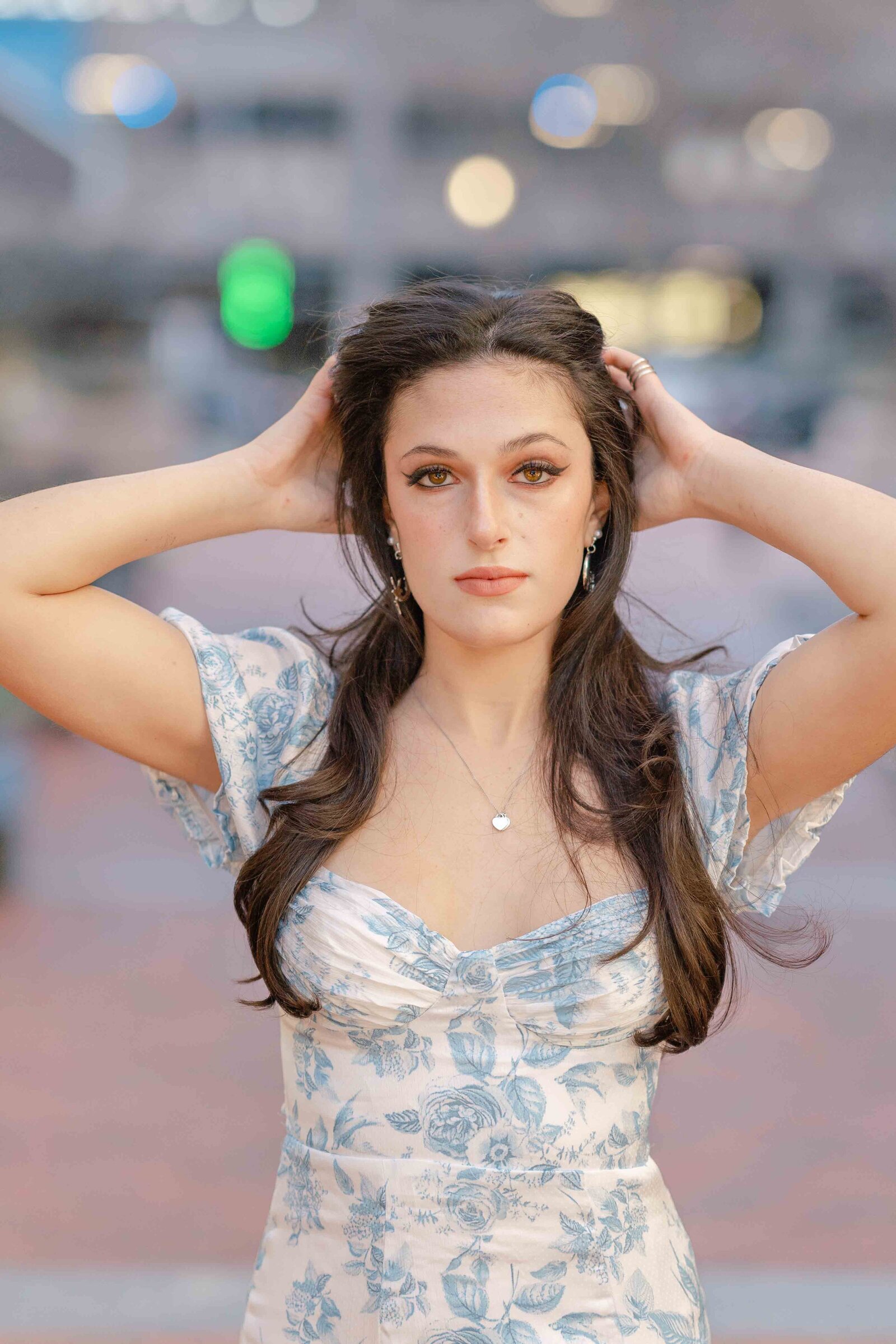 girl with hand on hair during Reston, VA senior photography