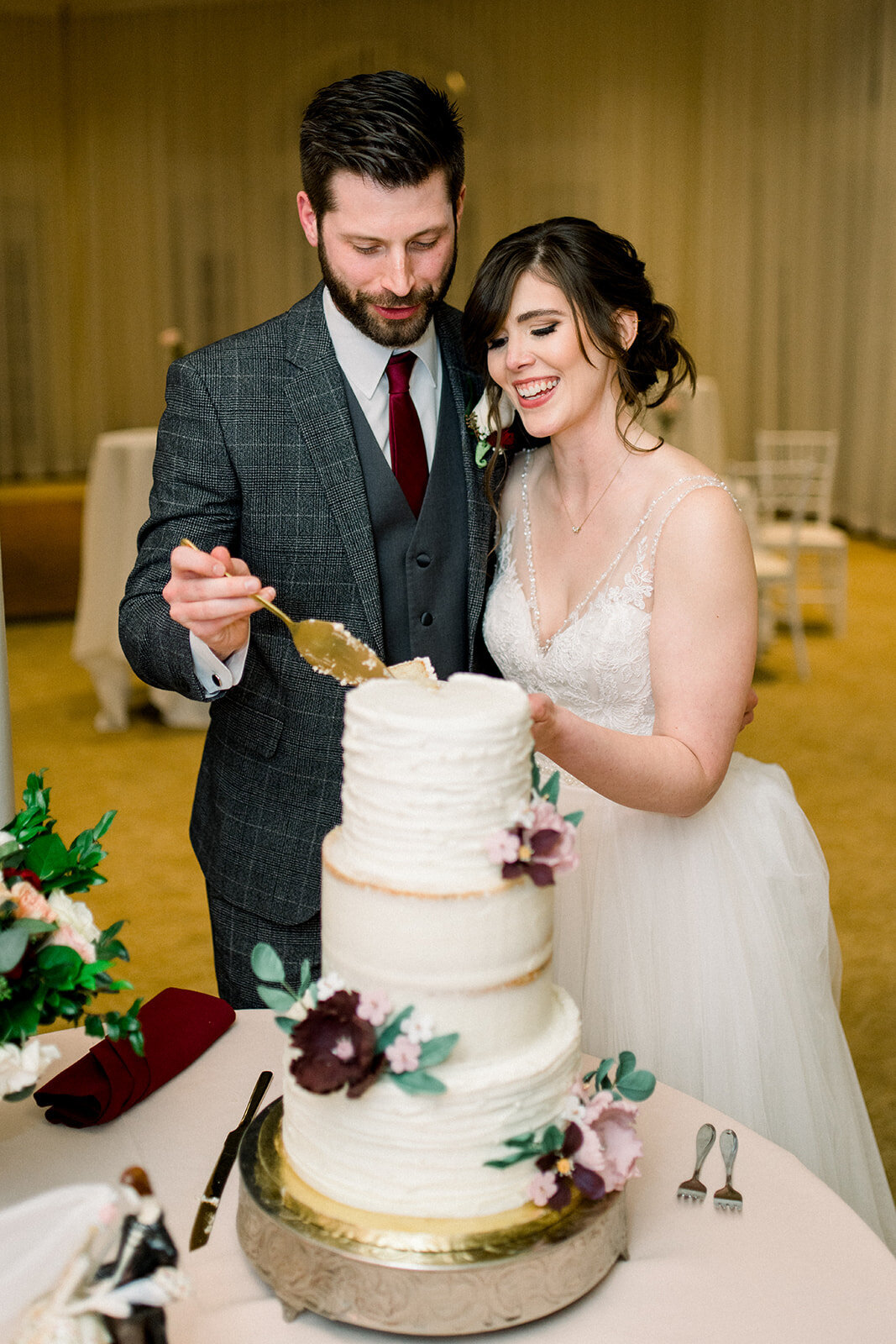 Romantic Bride and Groom cut the cake at Vizcaya Sacramento
