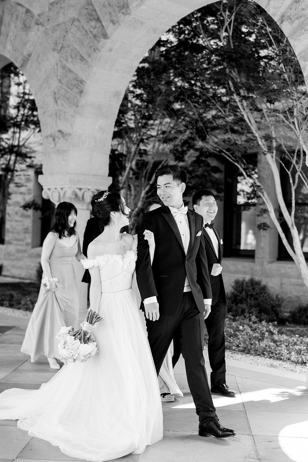 The newlywed couple shares a joyful moment outside the grand Filoli estate in Woodside, California.