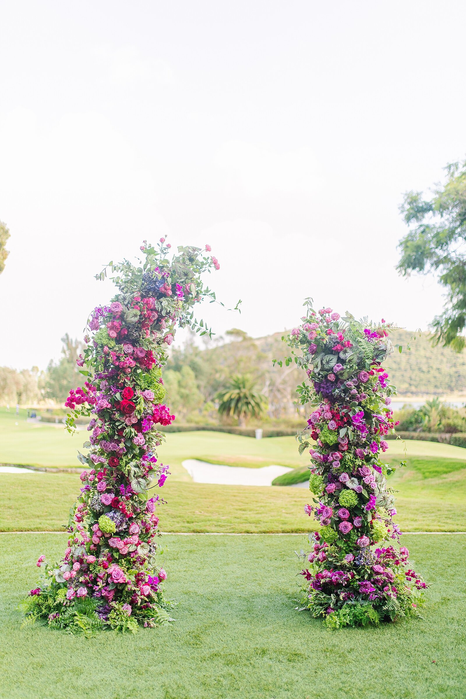 Floral arch at the Park Hyatt Aviara in Carlsbad, California by San Diego wedding photographer, Bree Sherr.
