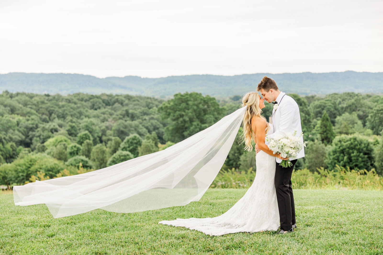 bride and groom embracing on their wedding day