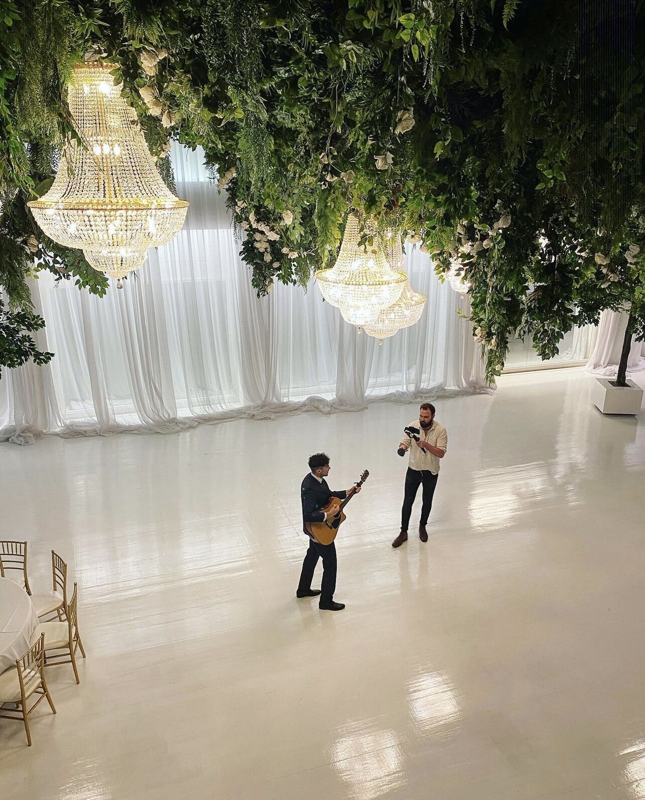 Whitestone’s floral ceiling and crystal chandeliers
