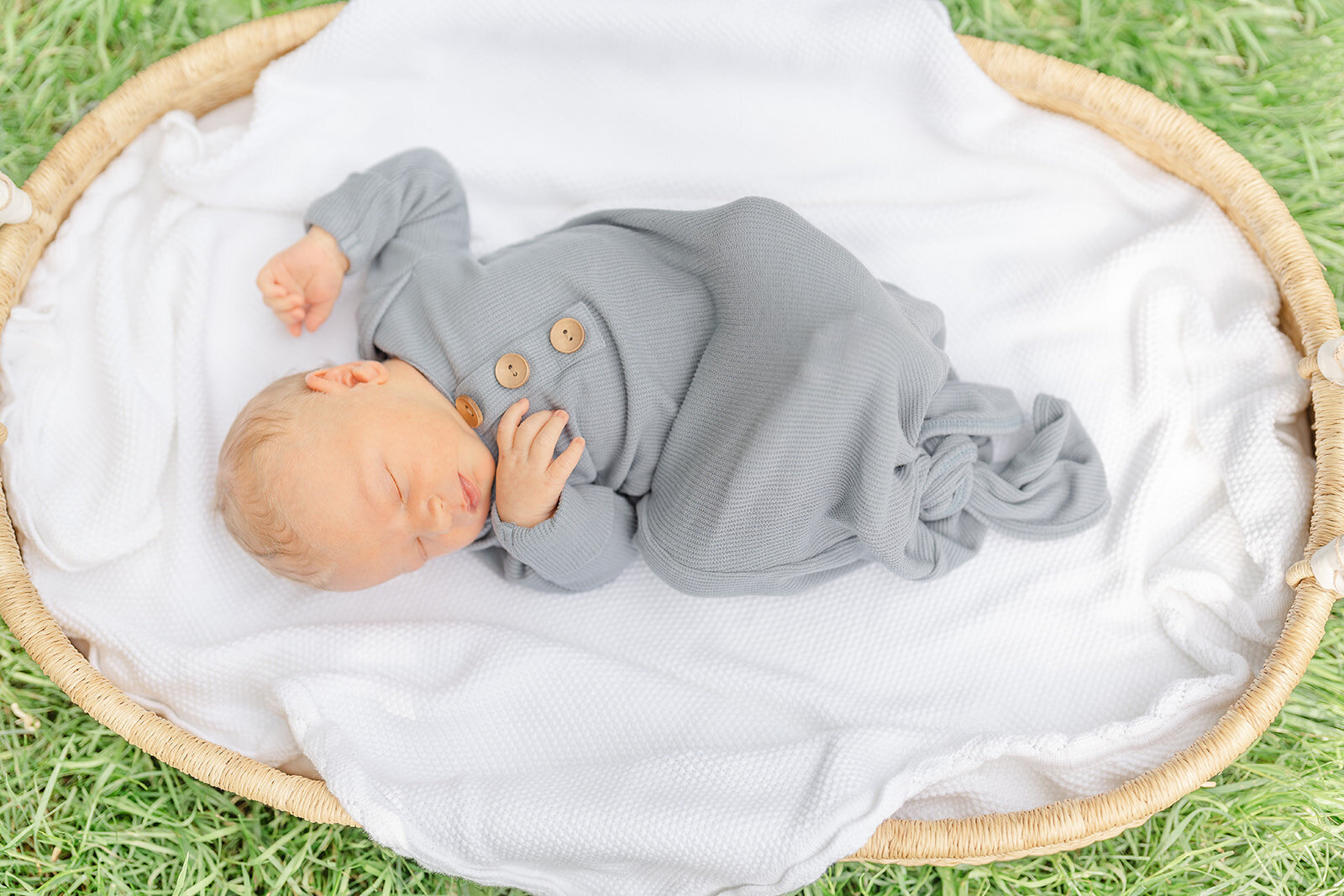 baby in the bassinet during outdoor newborn session in Leesburg, Virginia