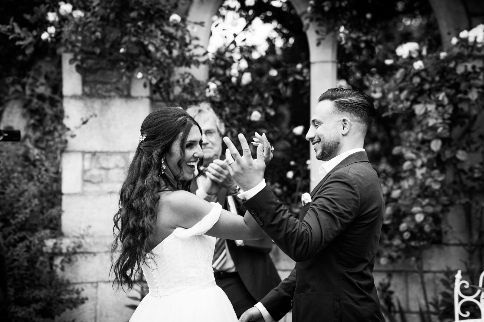 Wedding Photographer based in London capturing a candid laugh between the bride and groom.