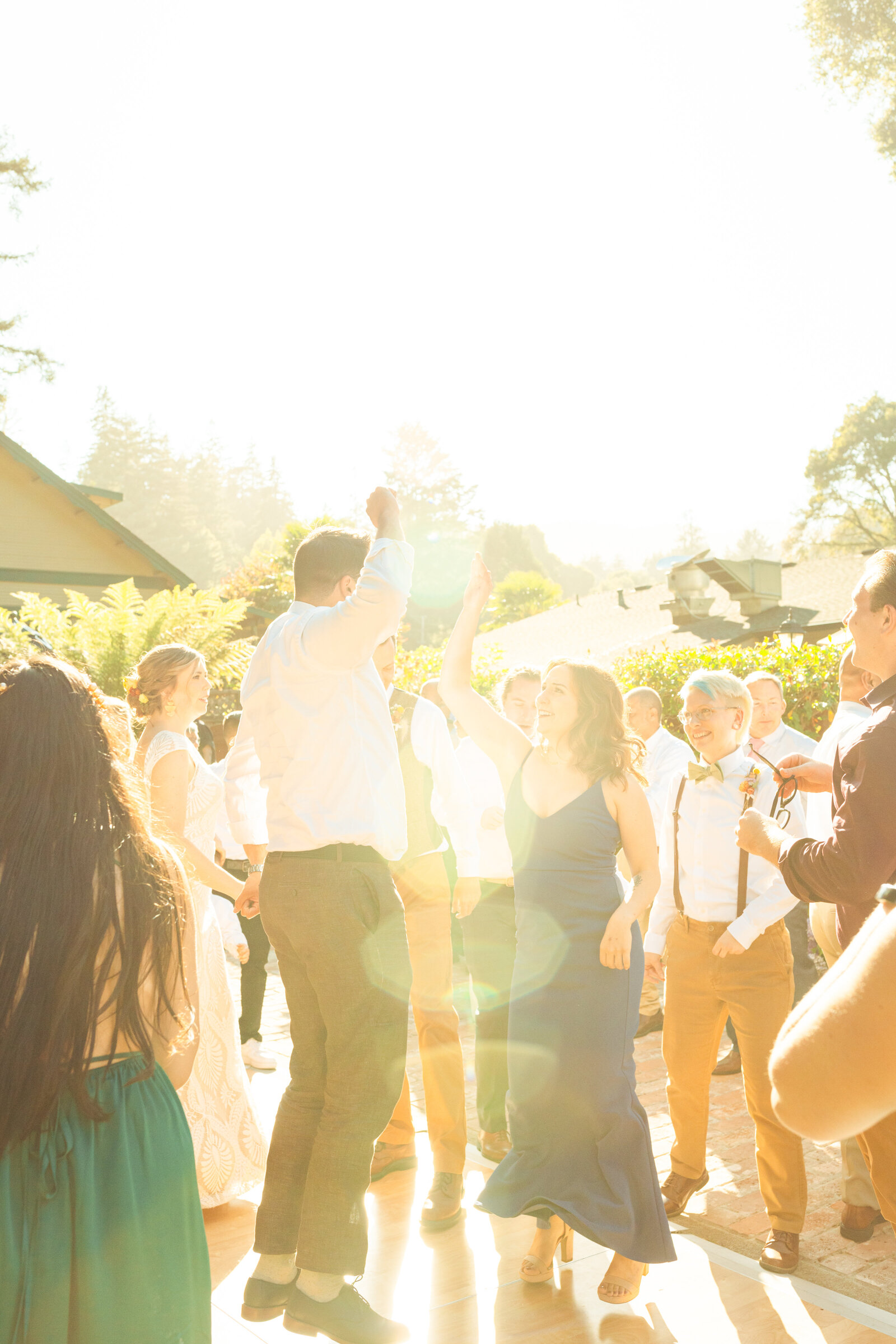 Colorful wedding reception in Santa Cruz, California in the redwood trees.