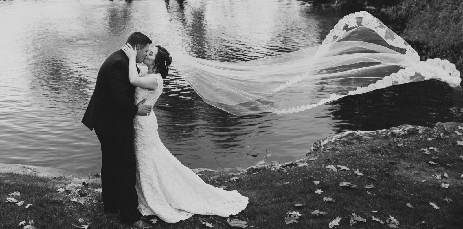 a bride and groom with a romantic veil shot at the farm at eagles ridge