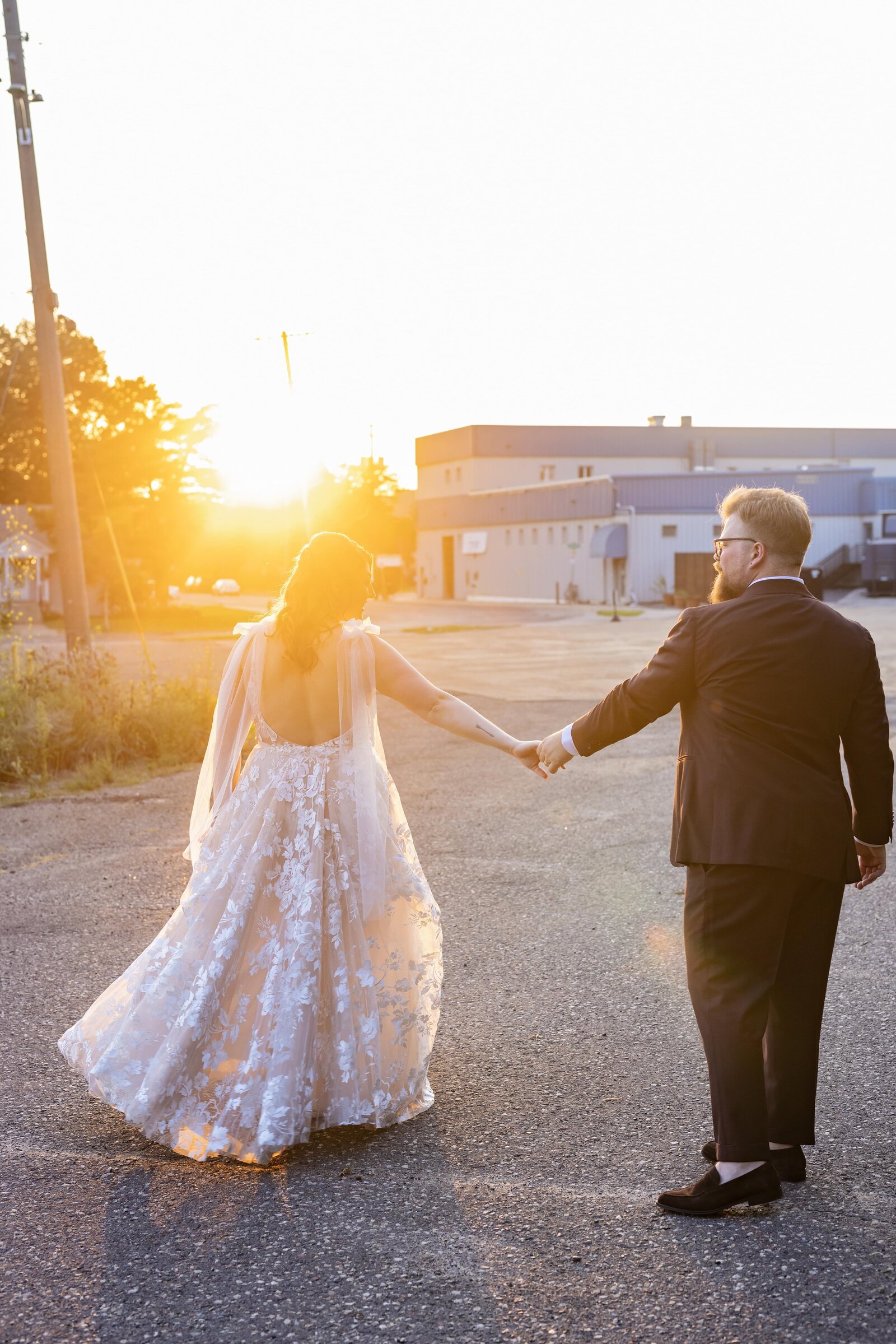 couple-wedding-sunset-photos-holding-hands
