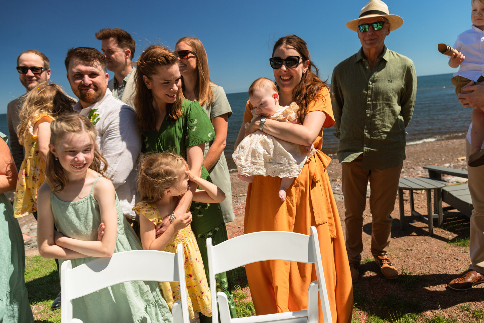 gathering together to take the best family photos ever taken on a wedding day