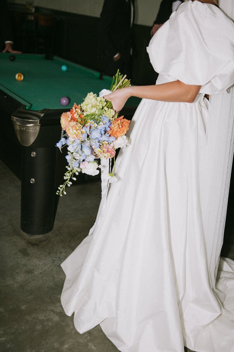 bride holding bouquet taken by Erica Rochelle photography idaho elopement photographer