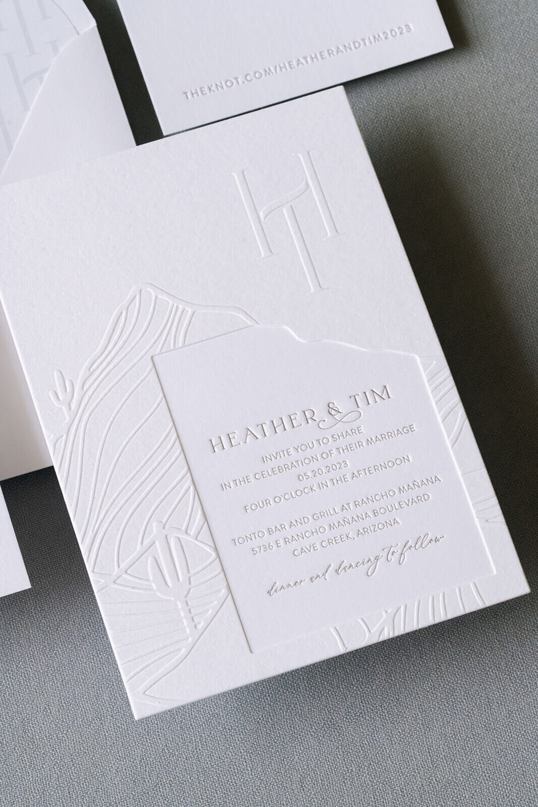 monochomatic-white-mountains-embossed-wedding-invitation
