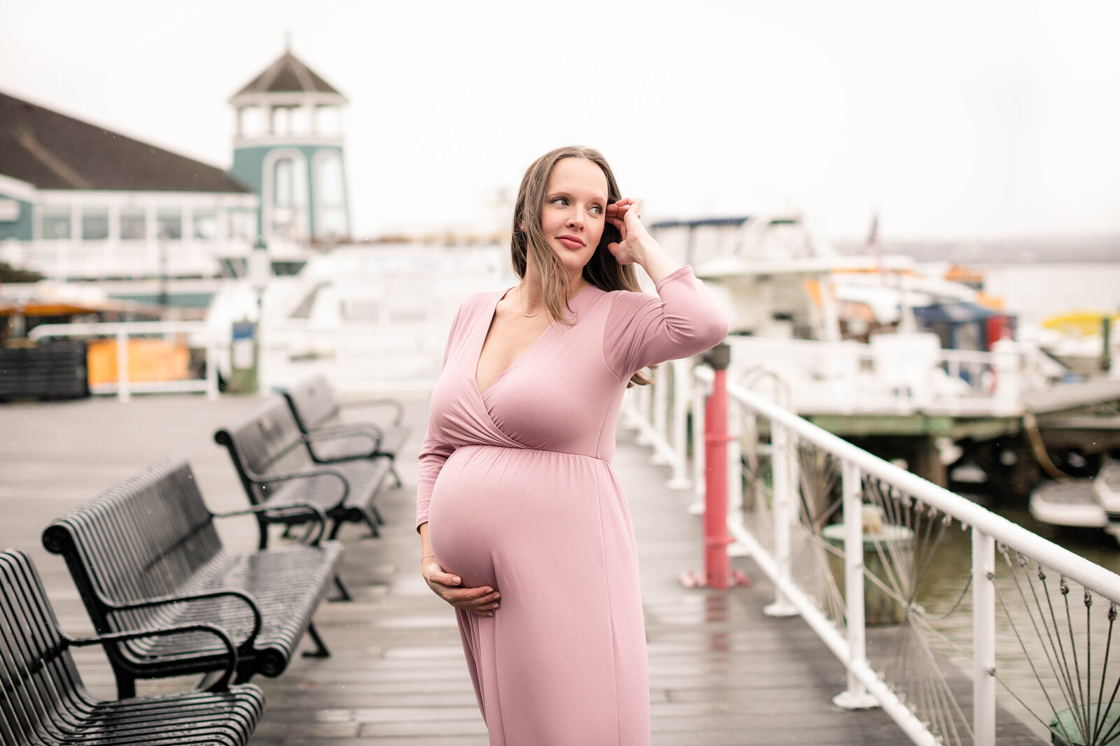 pregnant mom in pink dress on docks in Alexandria Va