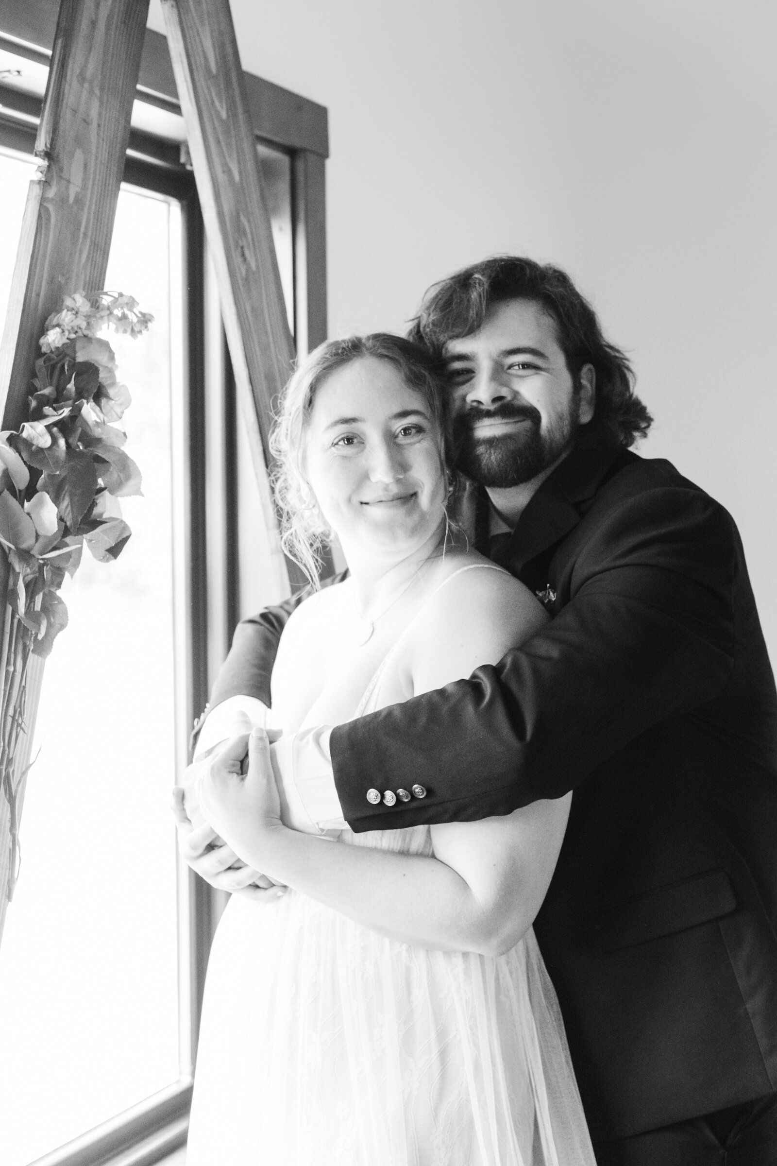 A couple celebrates their intimate elopement at a cabin at Big Bear Lake, California.