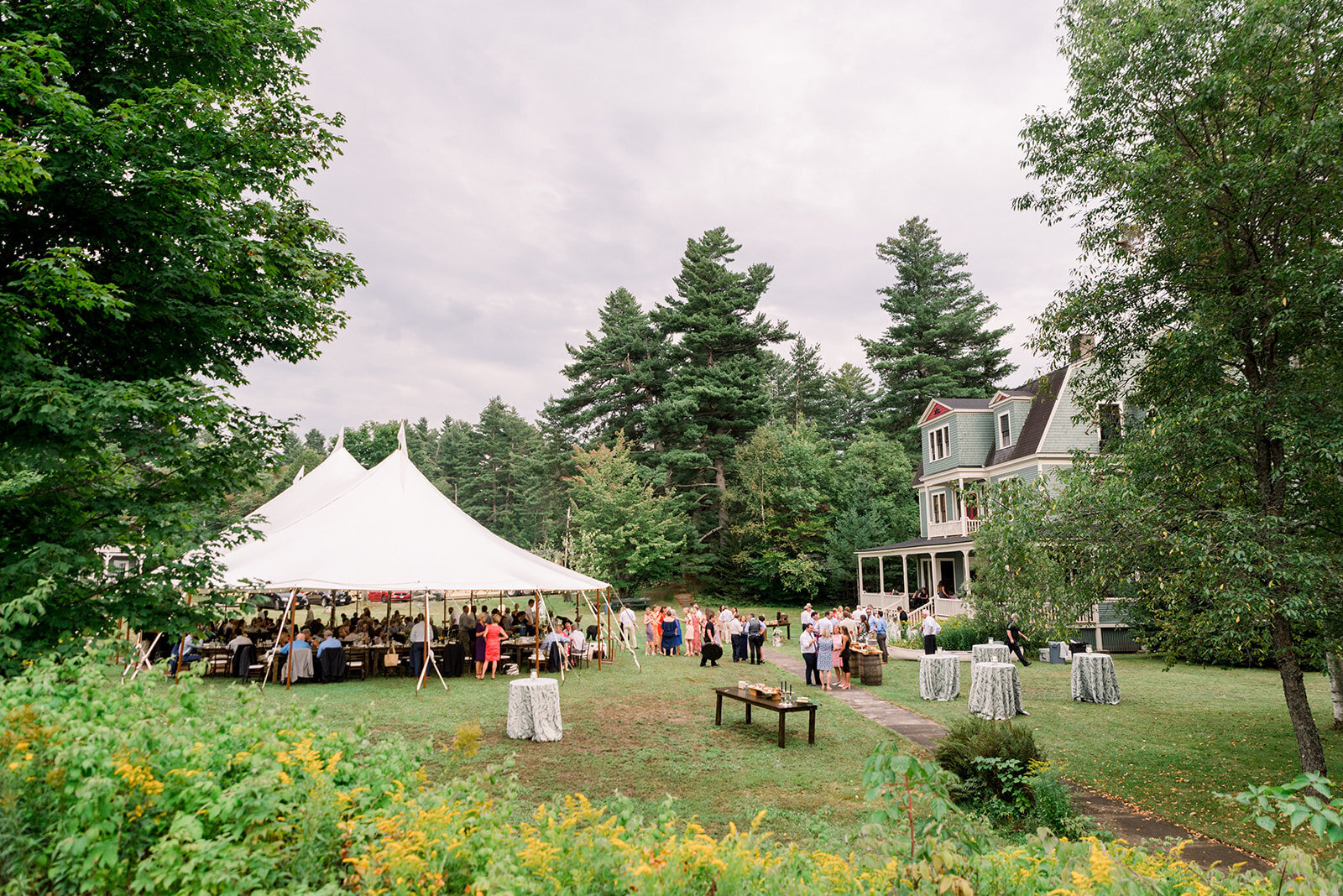 pole tent wedding on private residence in Loon Lake Beautiful Ballroom Wedding Hotel Saranac Photo Courtesy of Julia Rebecca Photography