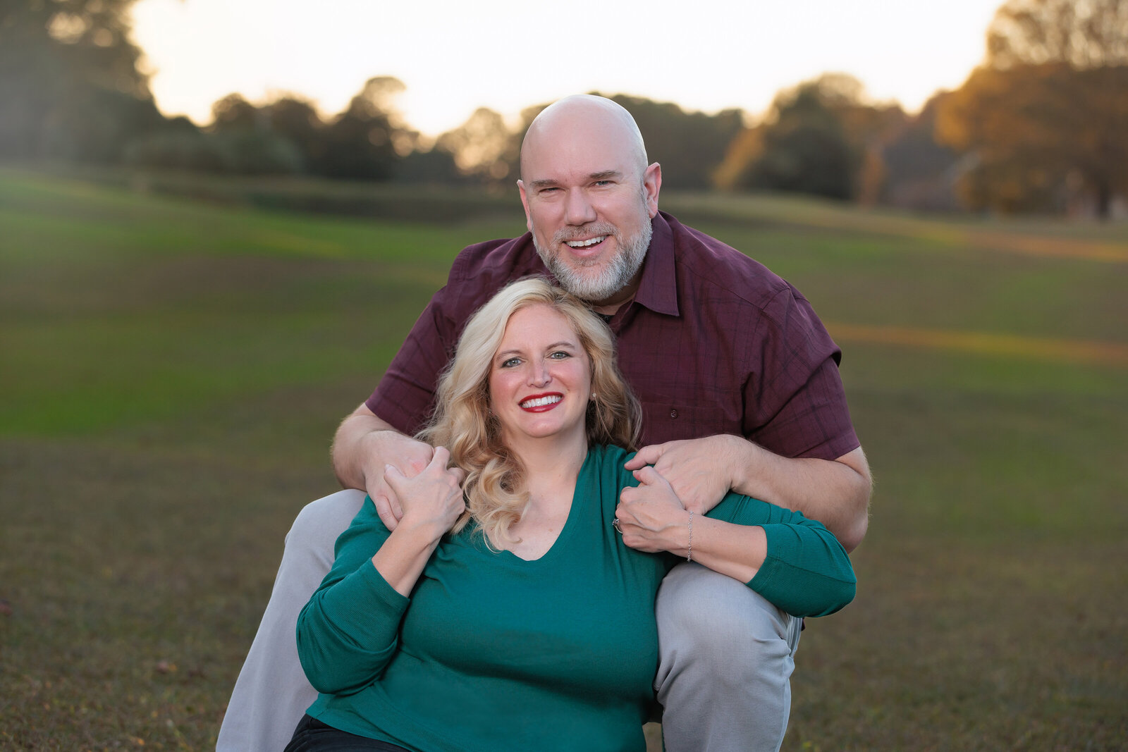 Holly Springs Park at golden hour husband and wife picture.
