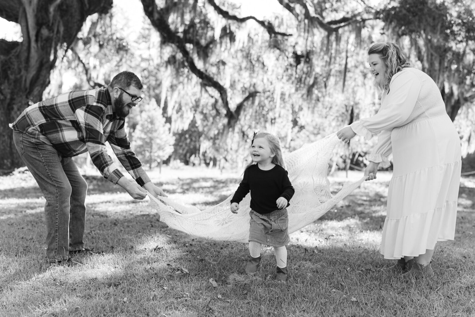 Little girl having fun at her family photoshoot with Constance Calton Photography