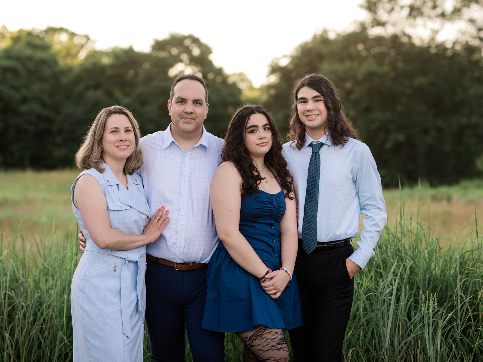Family posing for photoshoot at Westcreek Reservation