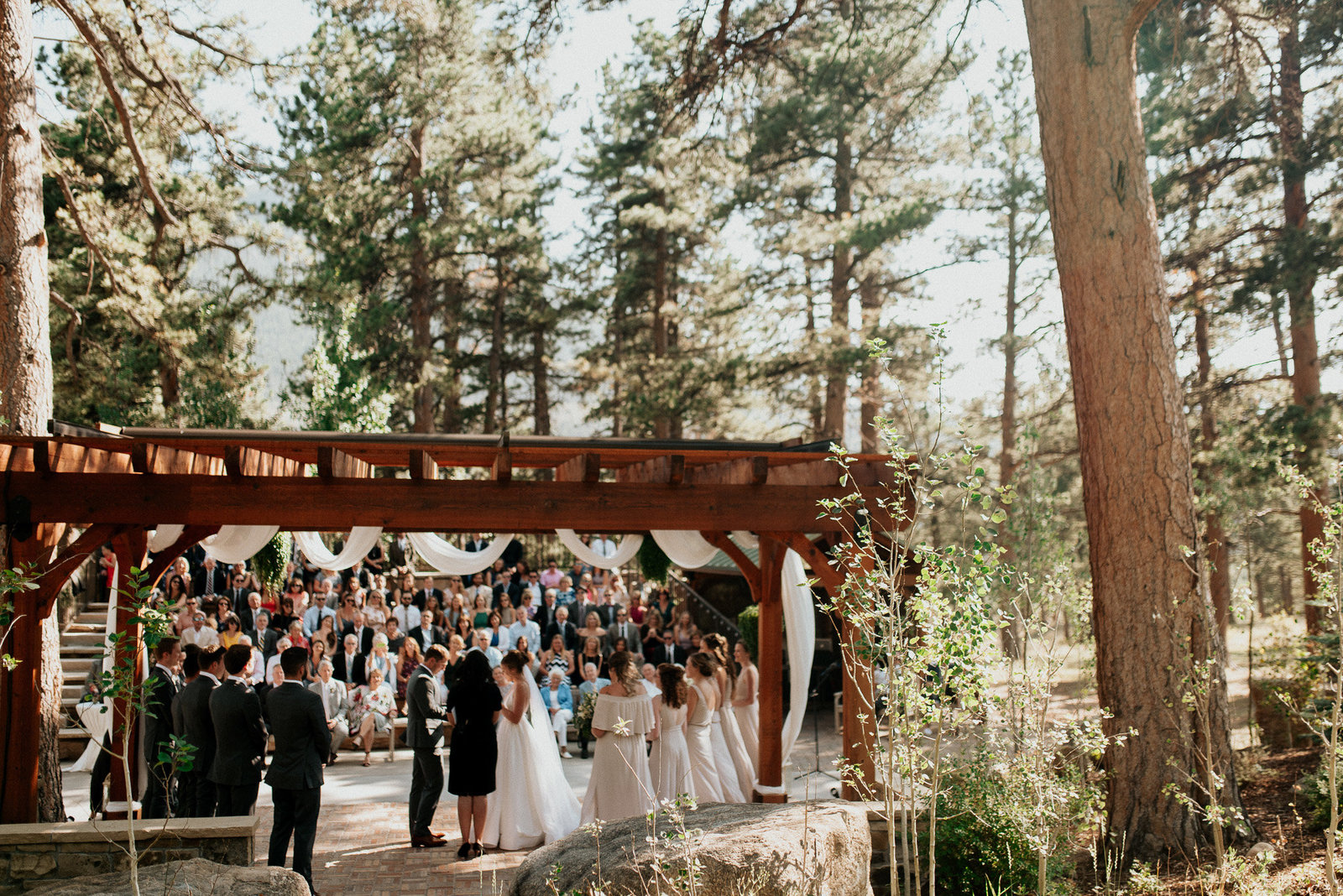 outdoor wedding ceremony in the mountains near larkspur colorado