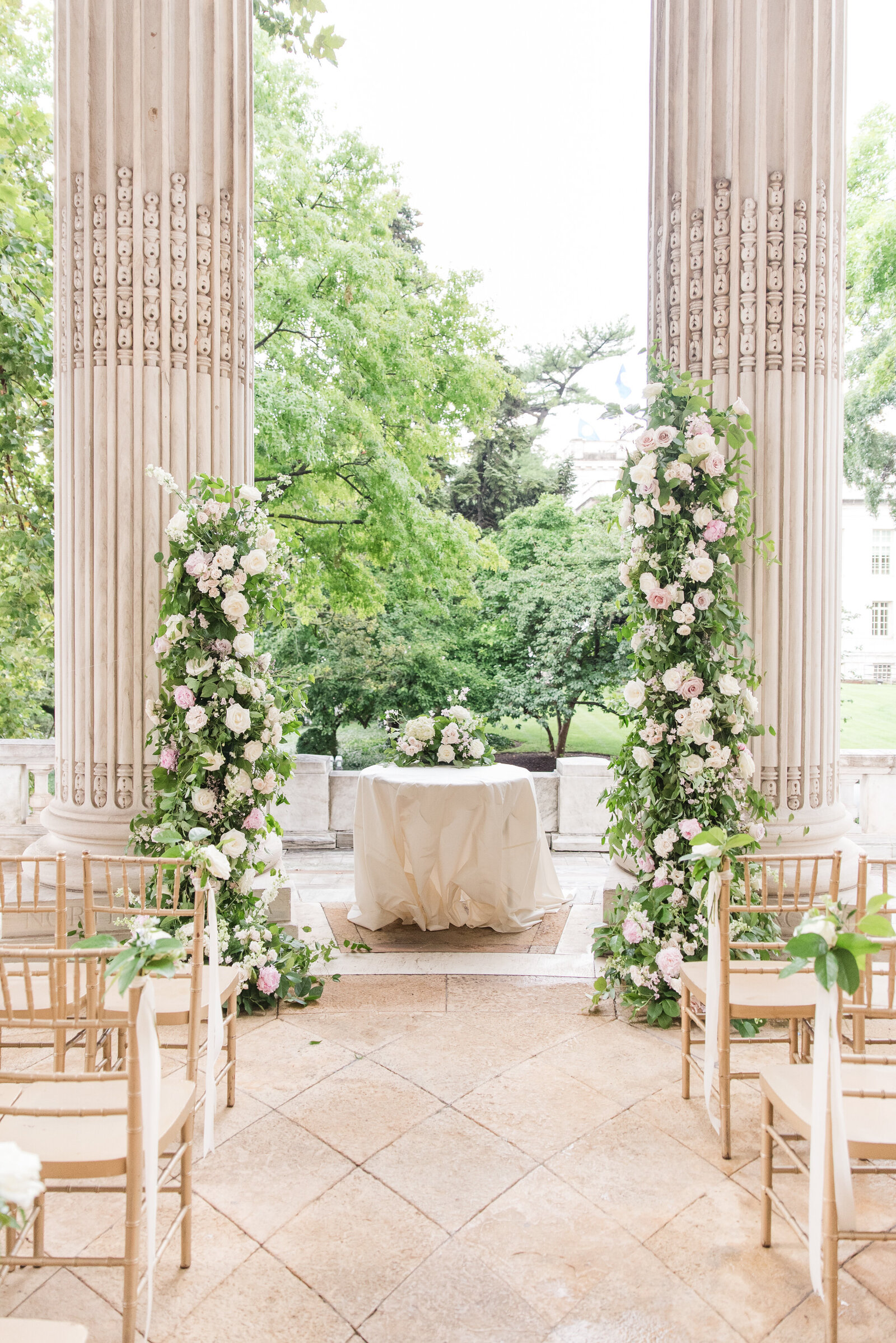 dar wedding arched ceremony floral arrangement