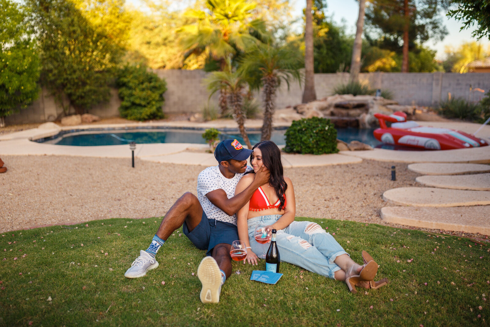 red white and blue themed couples session by the pool