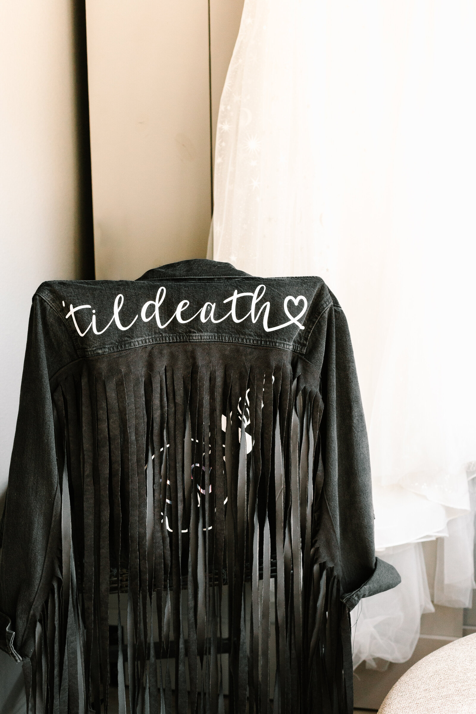 A bridal denim jacket that says Til Death.
