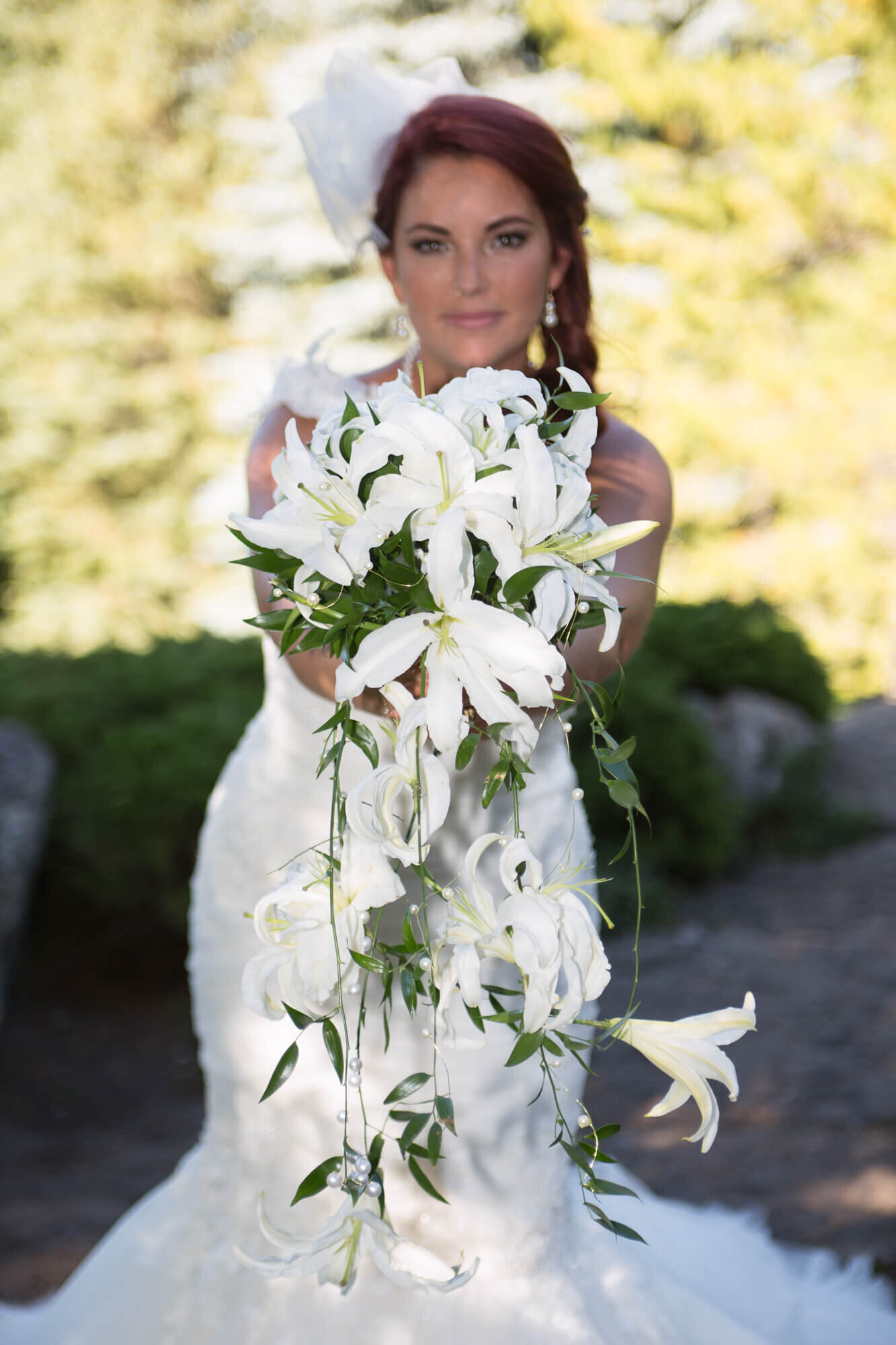 Bride holding our bouquet