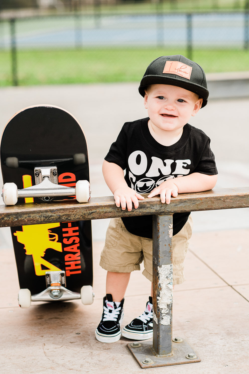 toddler boy with skateboard