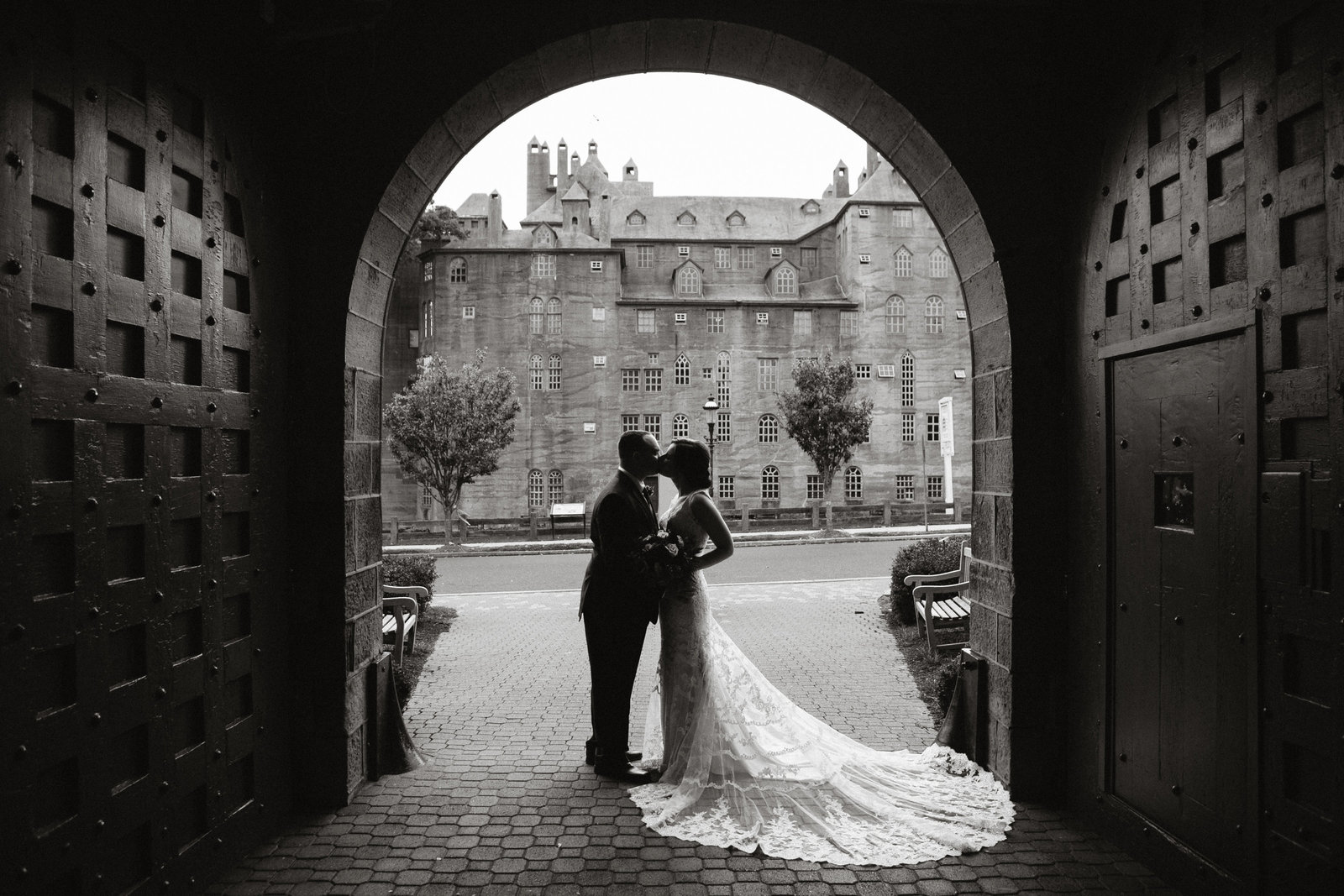 Bride and groom photographed at this castle like building on the Main Line.
