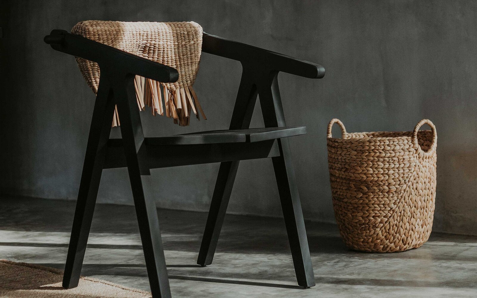 boho chair  Shou Sugi Ban yakisugi, interior design by jungle luxe tulum