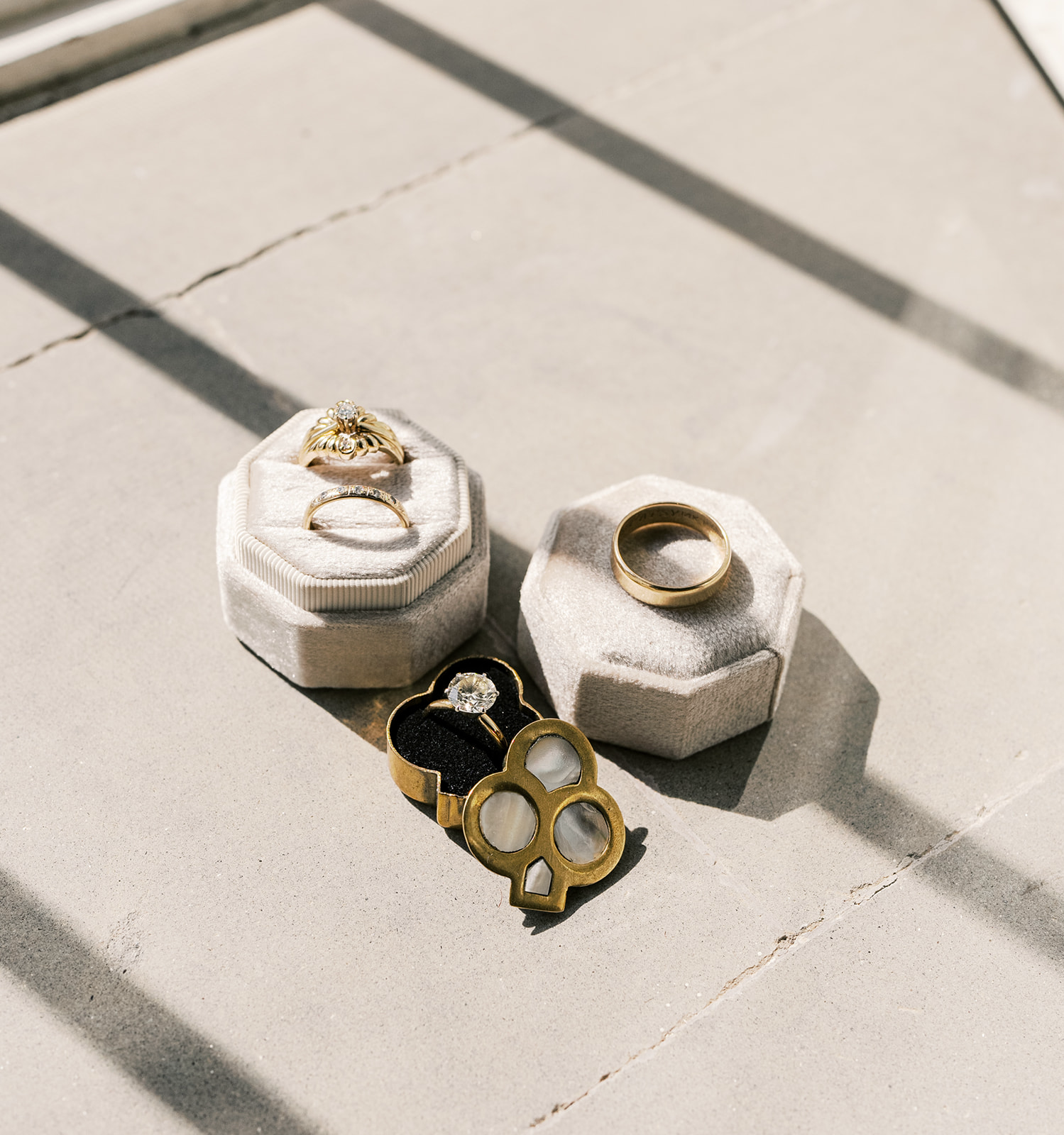 Set of elegant and luxurious wedding rings in a white display box | Megan Smith Photography