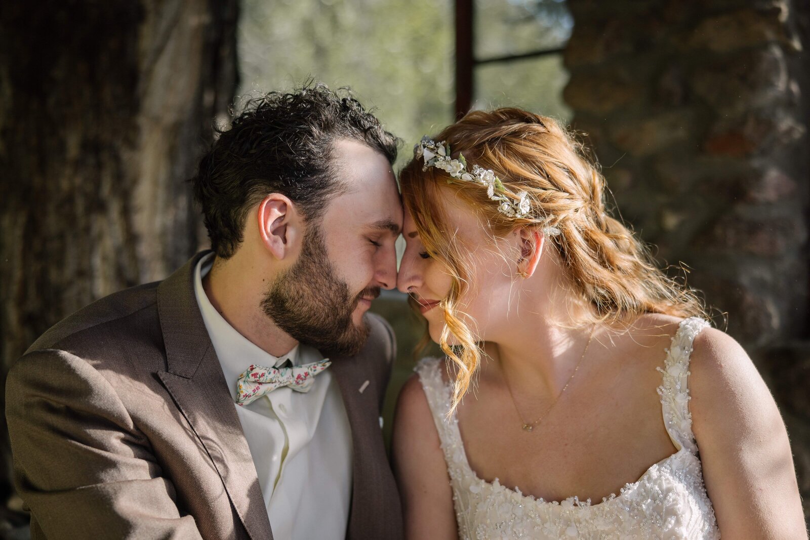 bride and groom touching foreheads