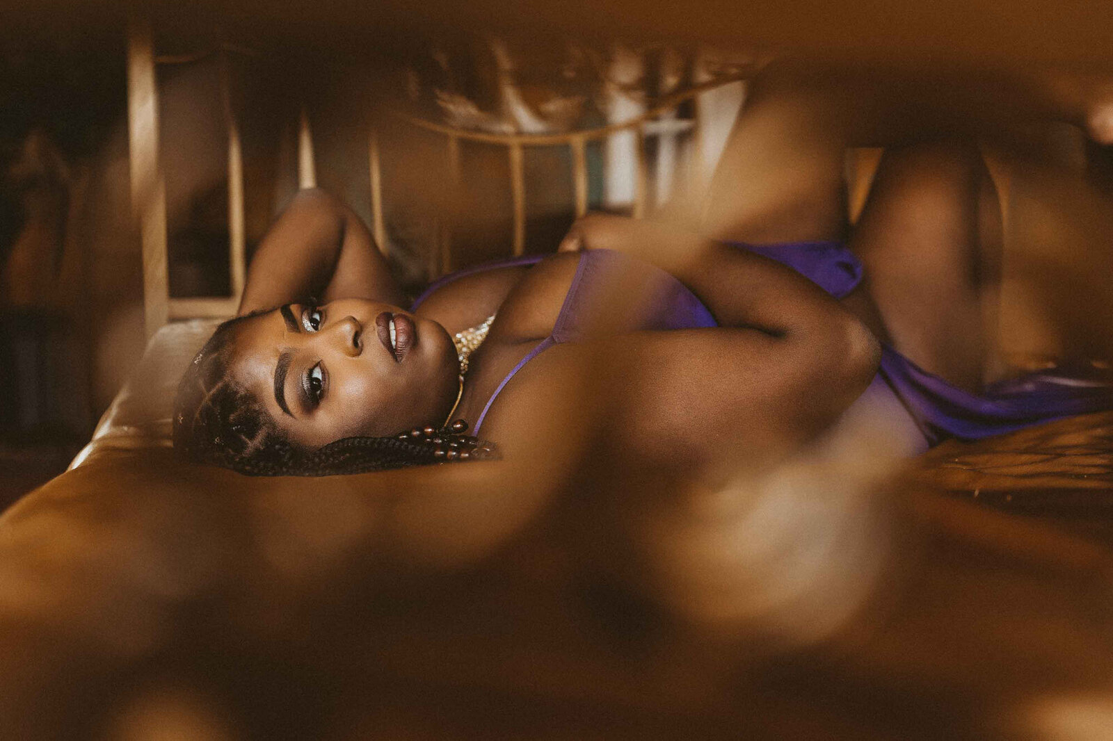 portrait of a woman in her purple lingerie