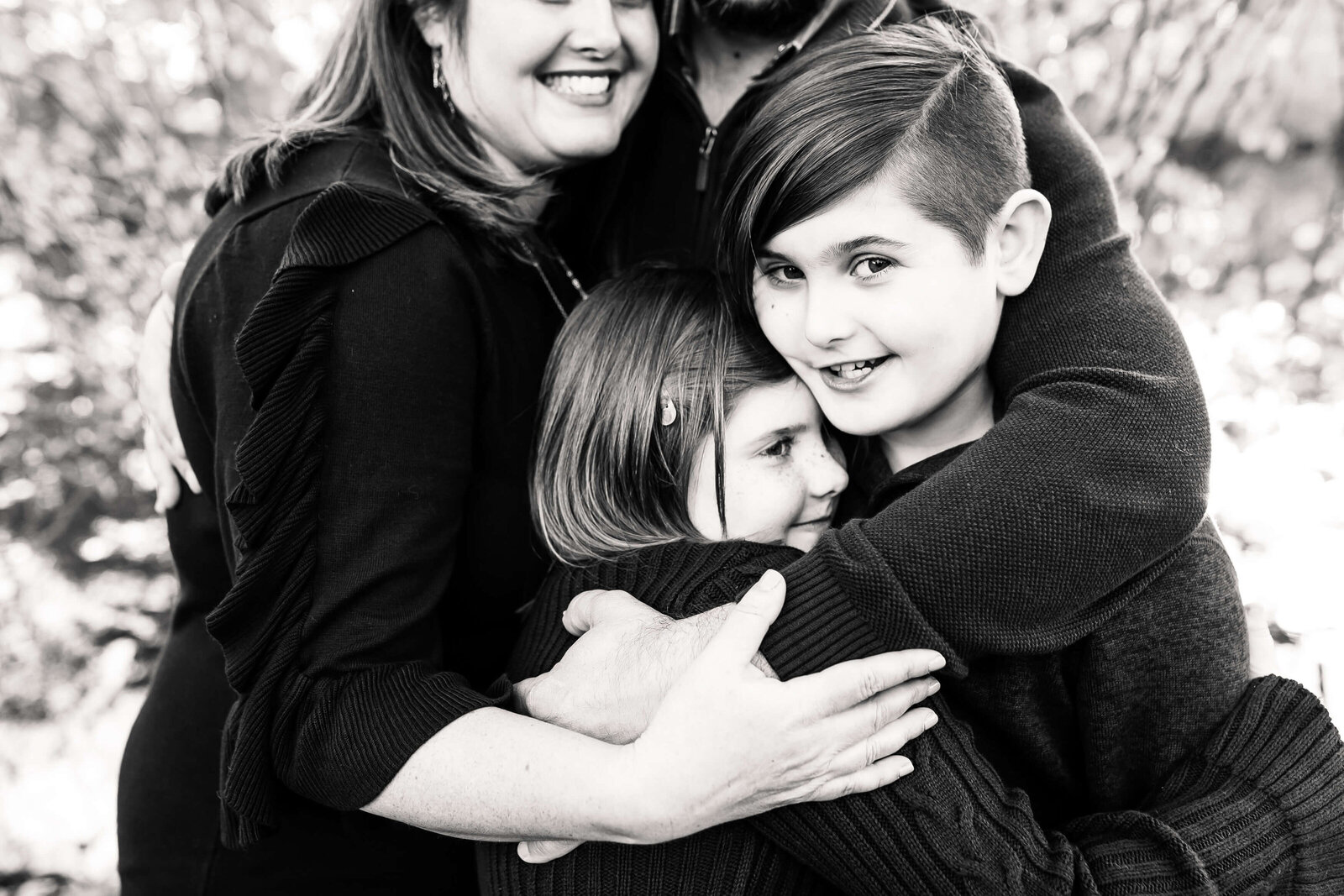 Black and white photo of NJ family hugging
