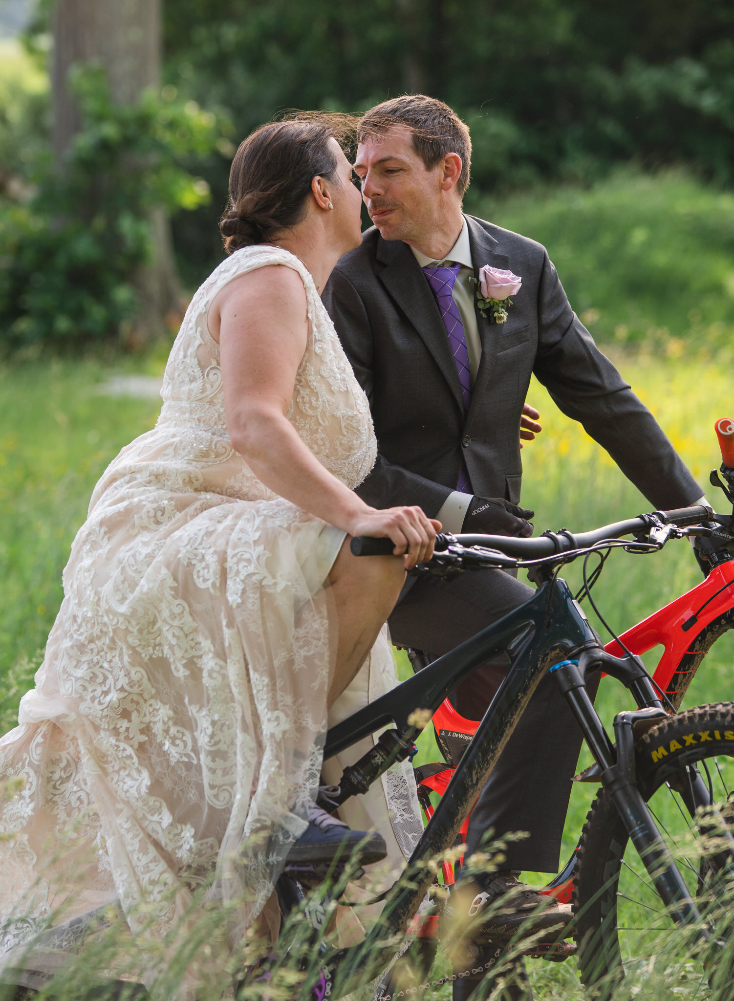wedding couple on mountain bikes in New England