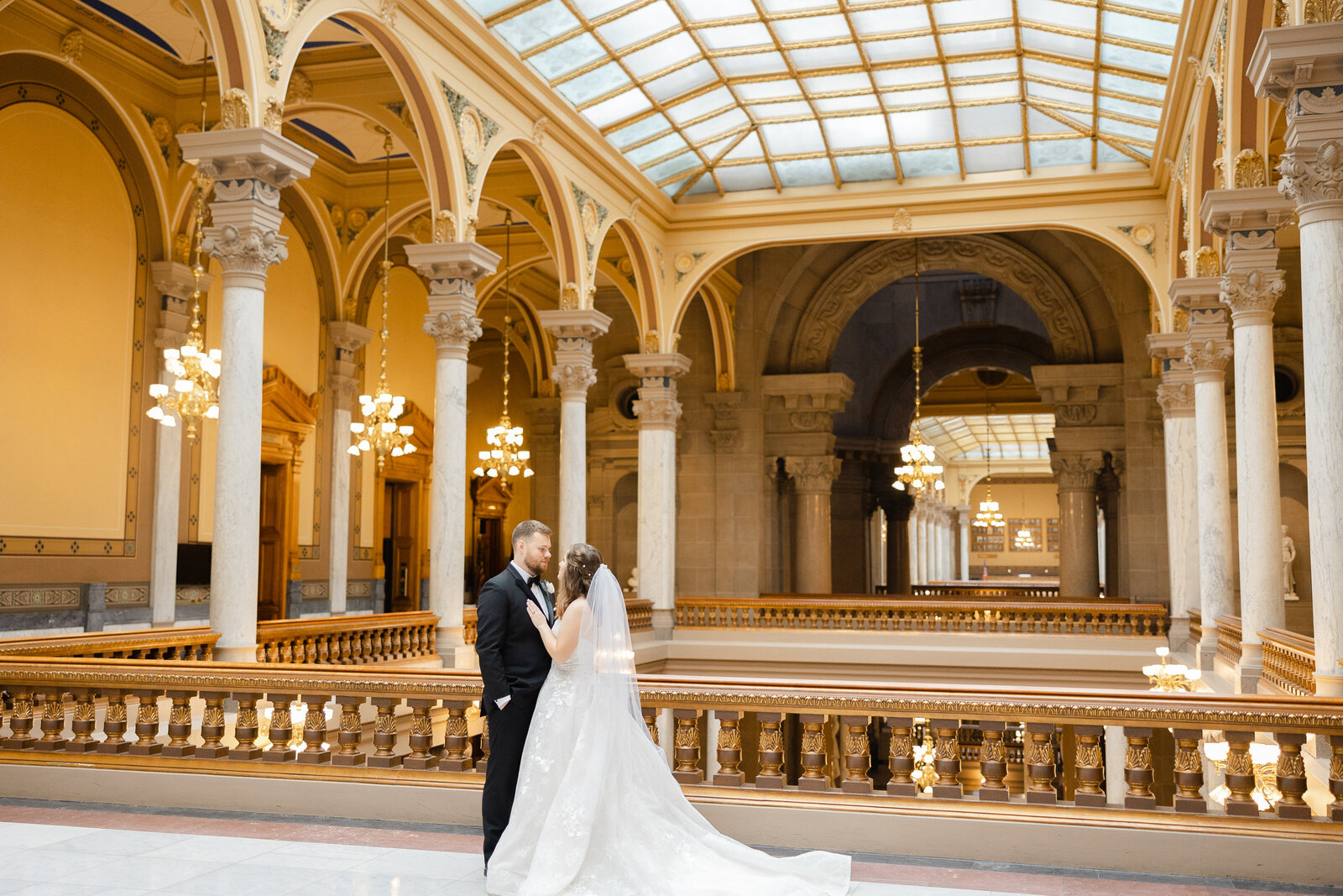 wedding couple standing in the Indiana statehouse