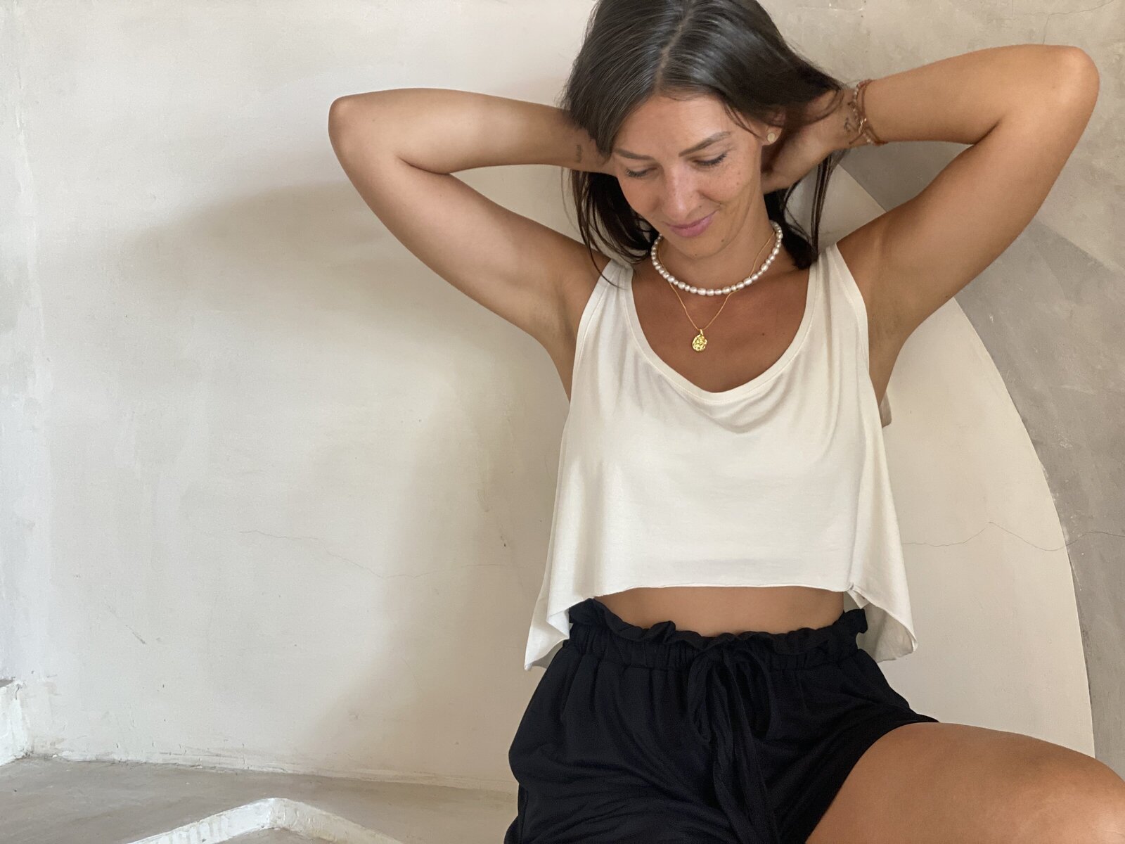 Bali Retreat Collection - casual yoga cropped vest highlow raw cut hemline - Island White neutral tone Sustainable yogawear brand YinSide Yoga Bali