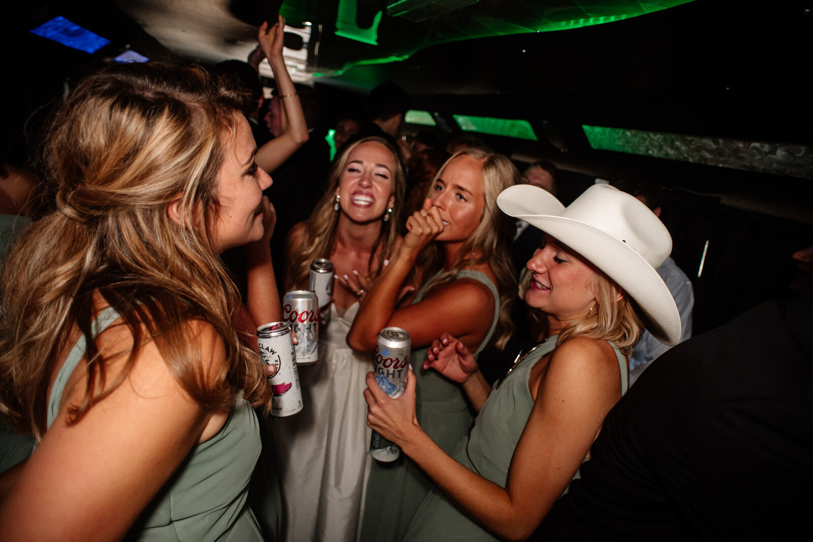 colorado cowgirl drinking beer with her bridesmaids