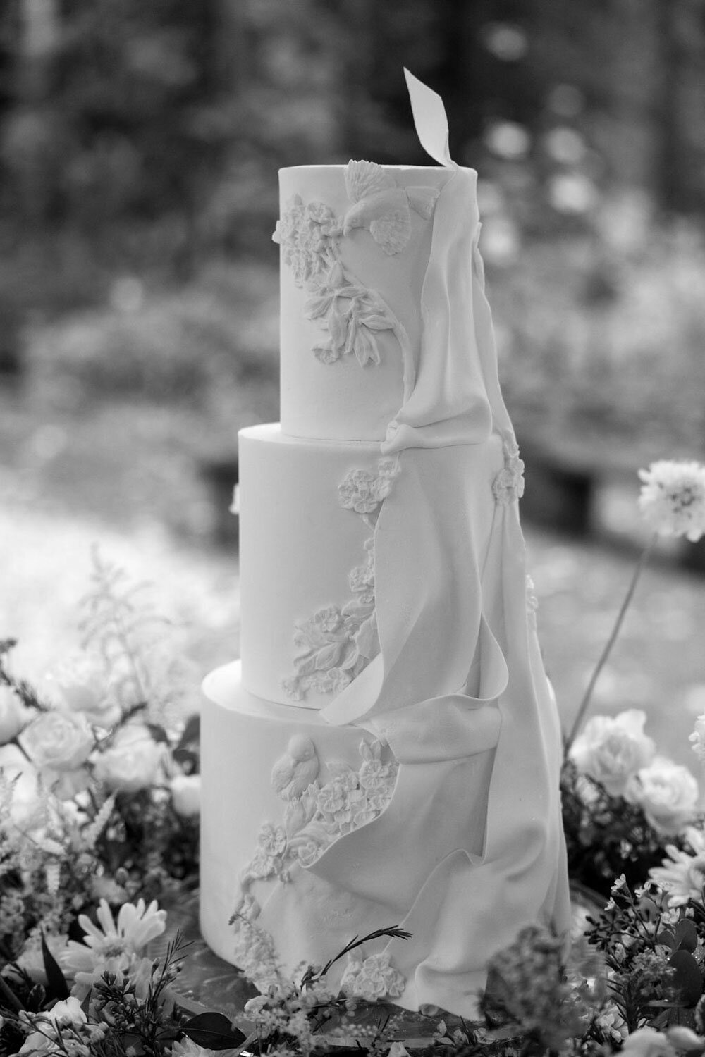 black and white photo of wedding cake