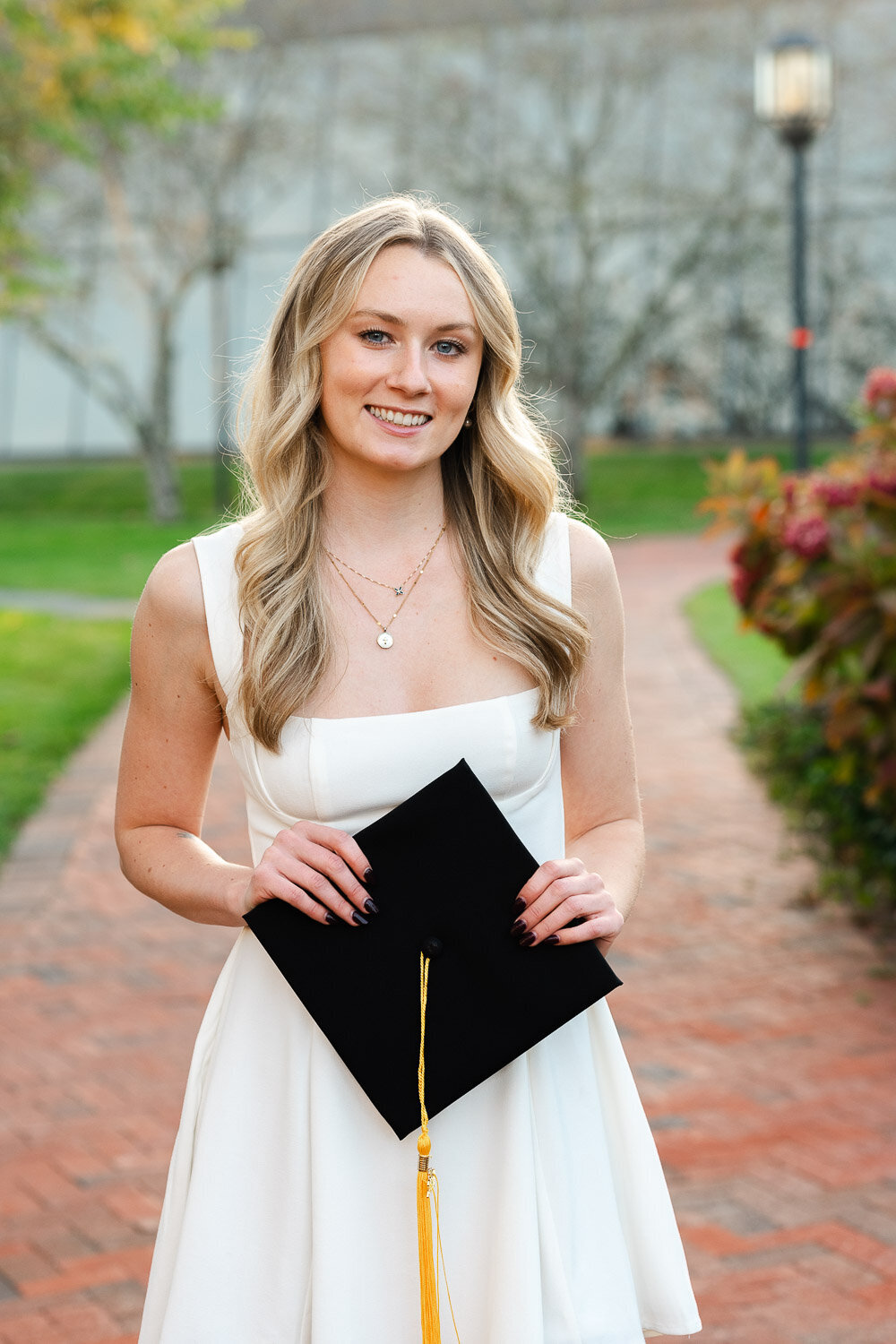 senior girl with cap