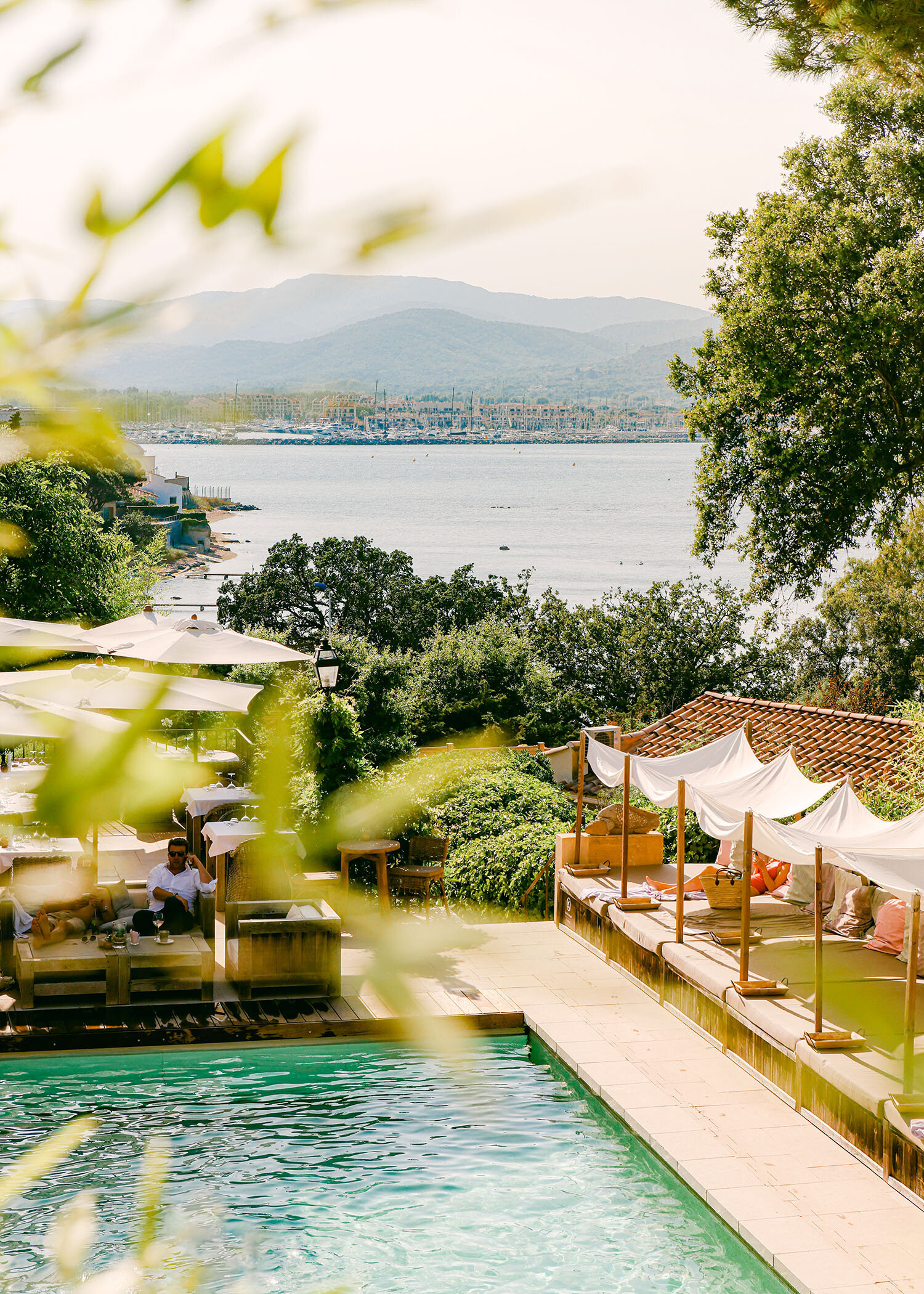 upscale boutique hotel with view of ocean and pool