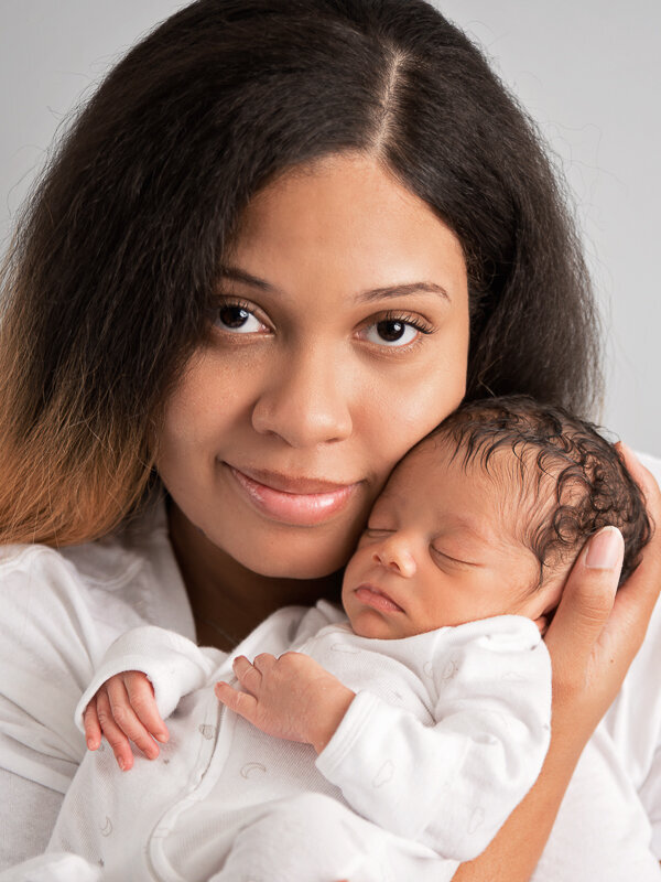 East Brunswick NJ Newborn Photographer Held by Mommy