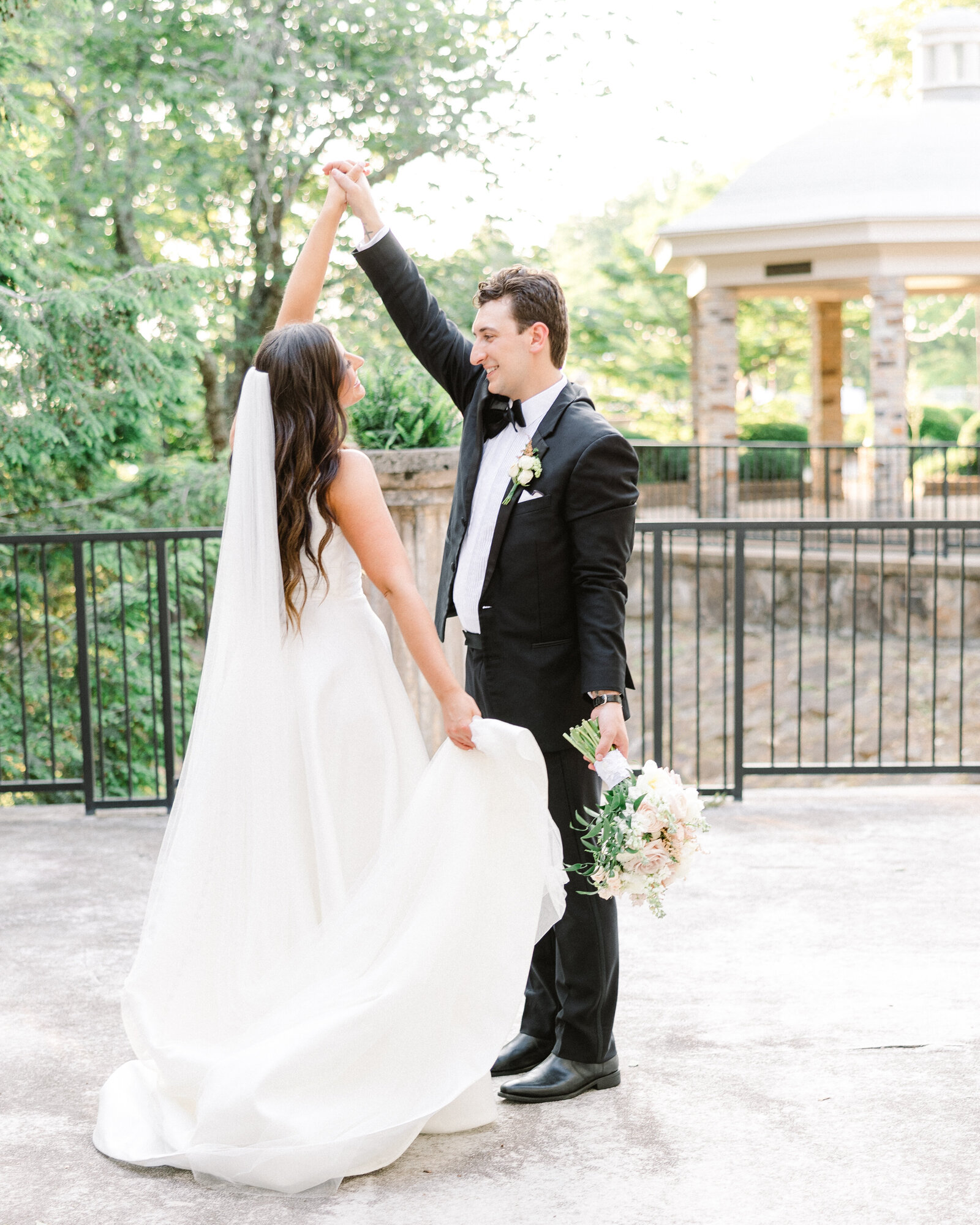 Timeless wedding moment of Sarah Kate and Thomas under natural light, showcasing personalized wedding photography in Alabama.