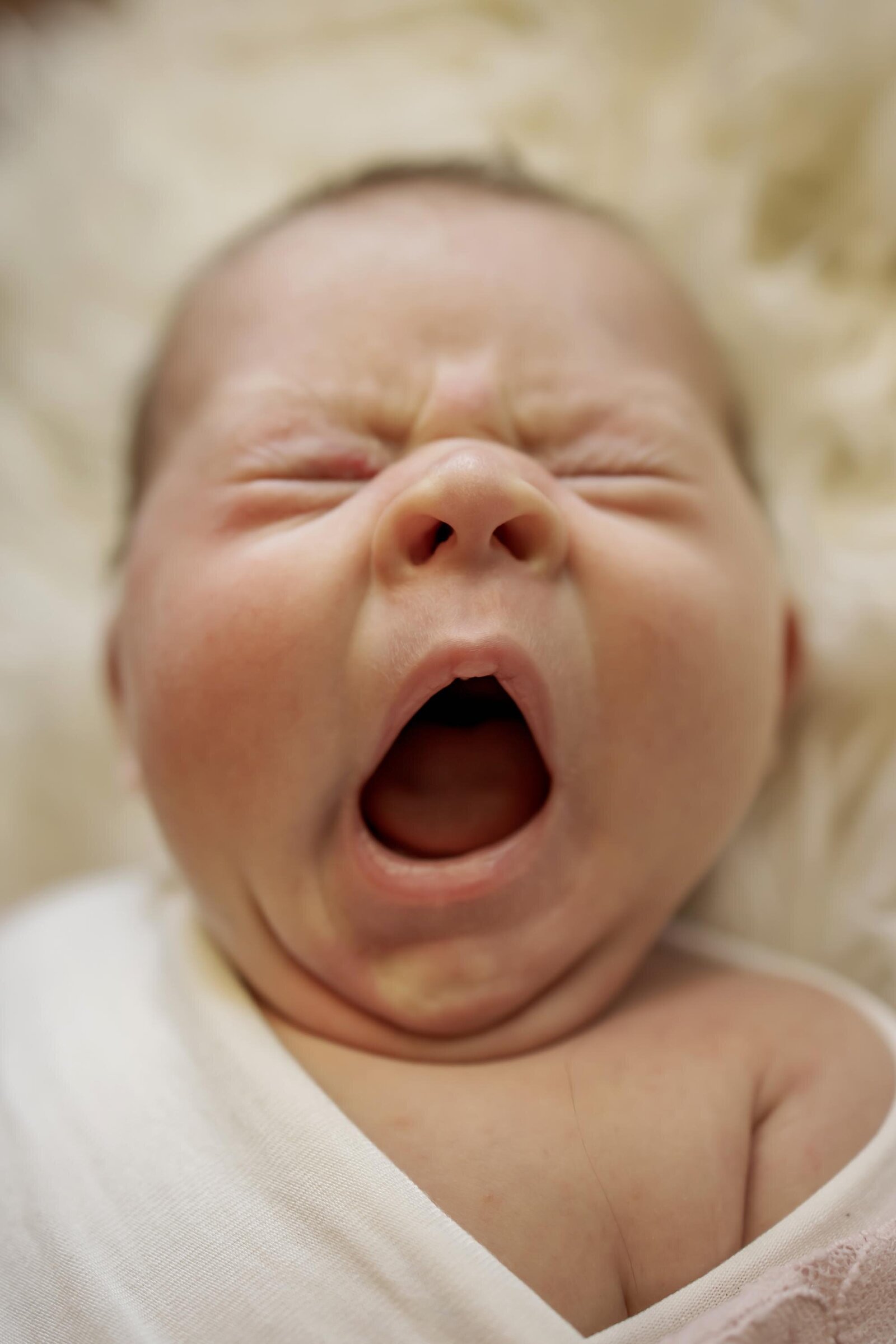 newborn baby yawns