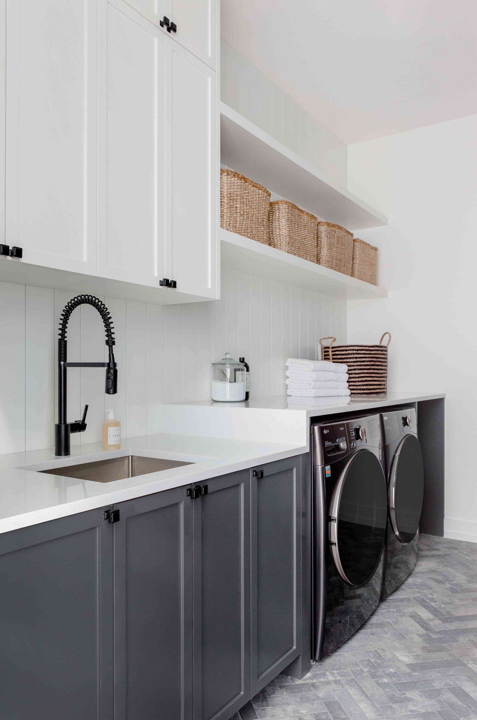 Nuela Designs White and Gray Laundry room Two Tone Cabinets