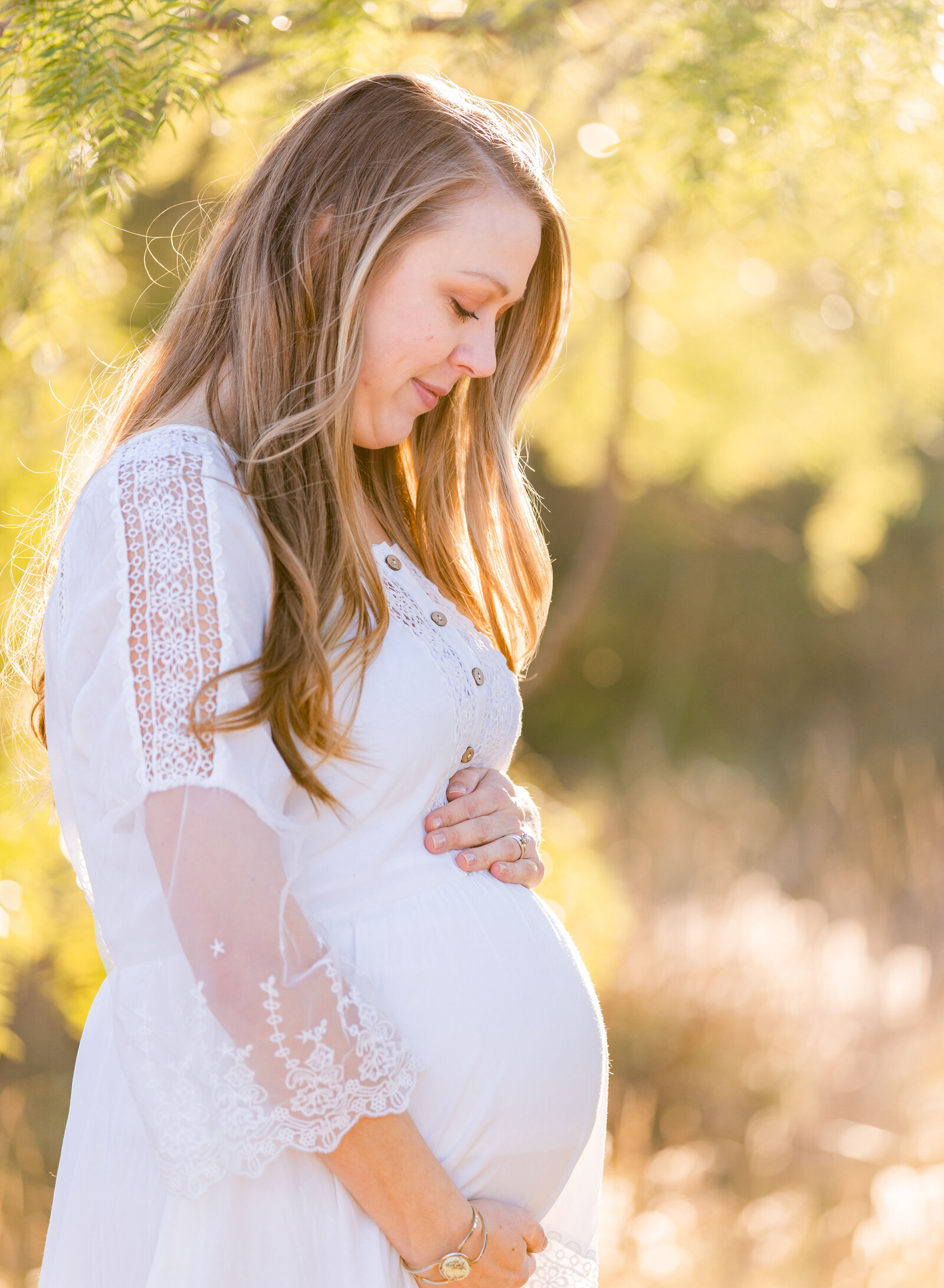pregnant woman showing off baby bump