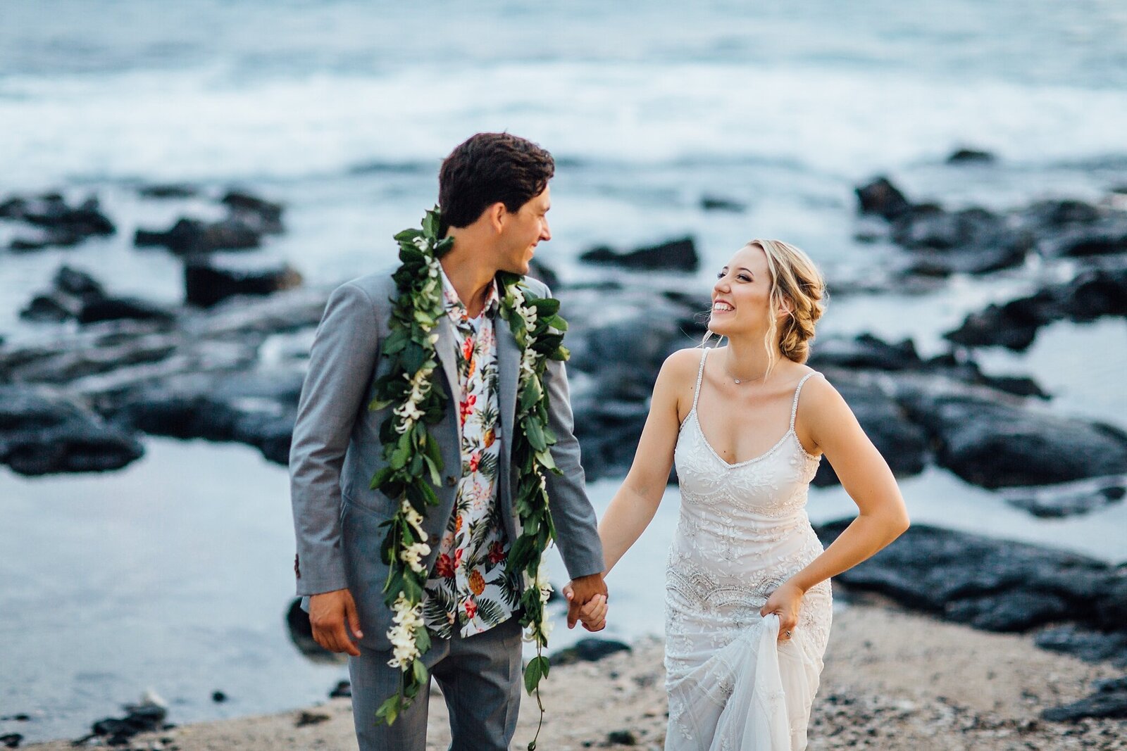 bride and groom laughing during big island wedding