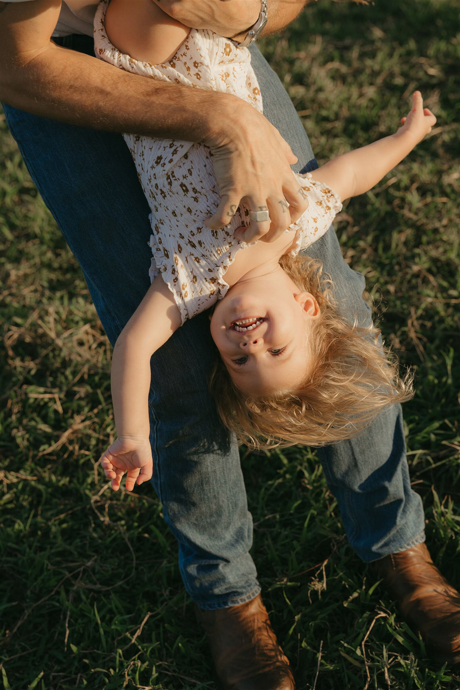 Love on Maui during a family photography session, natural laughter and candid joy.