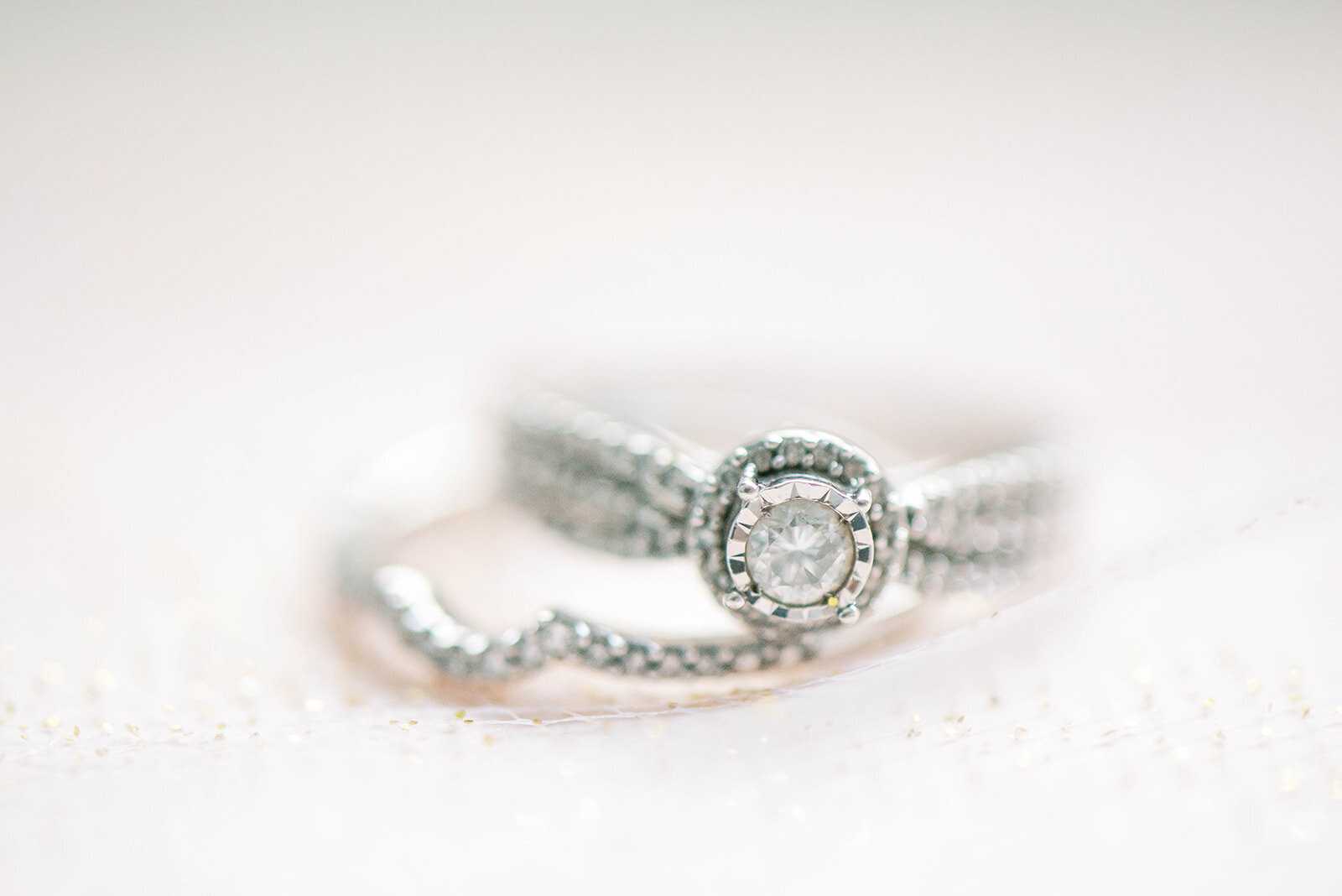 wedding ring and engagement ring detail shot
