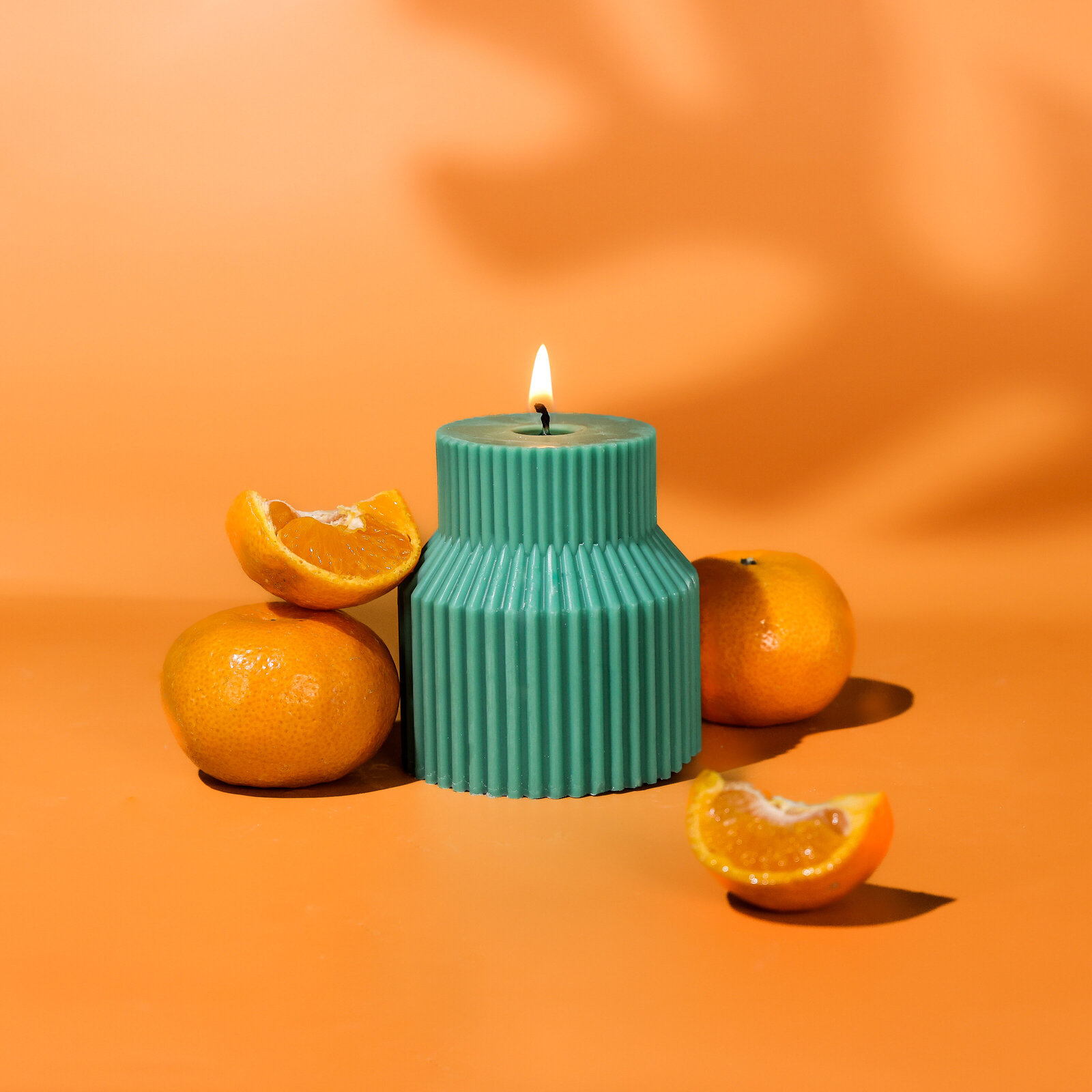 California boho molded candle product photography with shadows by styled product photographer Chelsea Loren