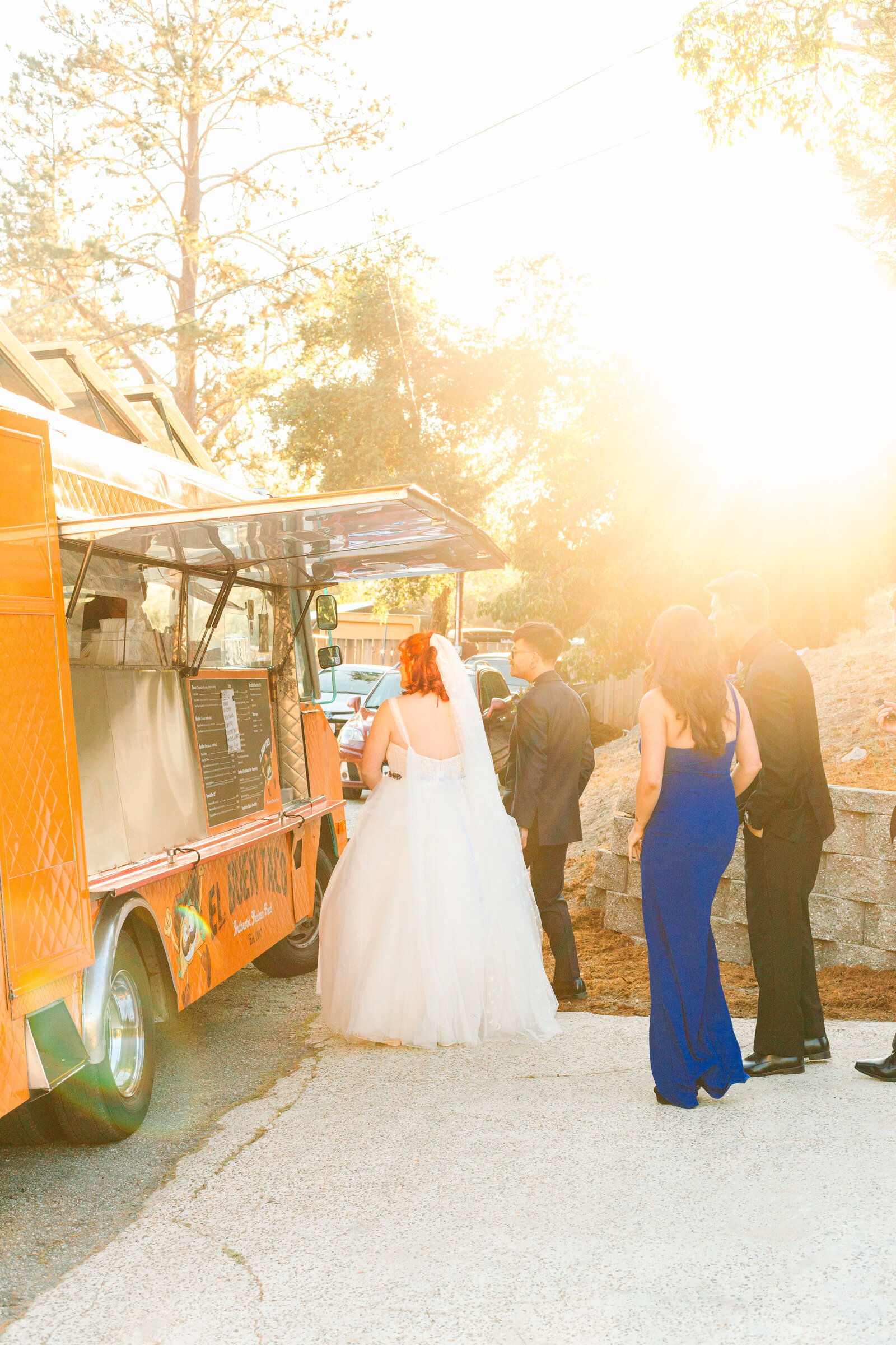 Taco truck for dinner at a backyard wedding.
