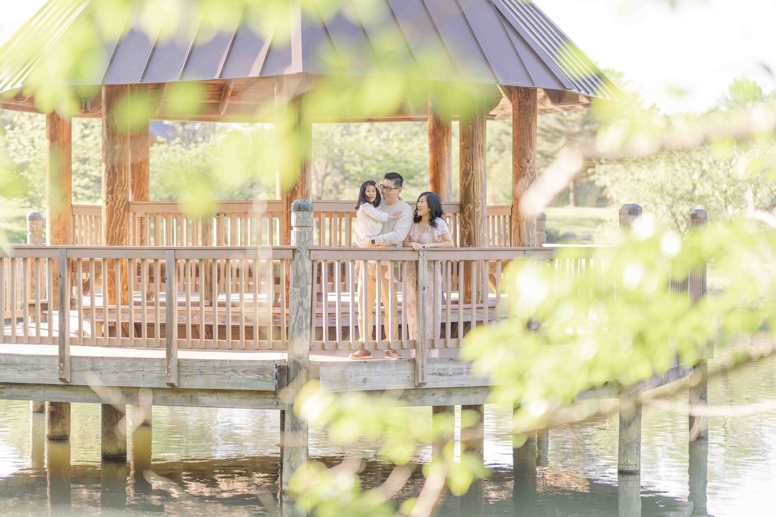 family in a gazebo during maternity photo Ashburn, VA